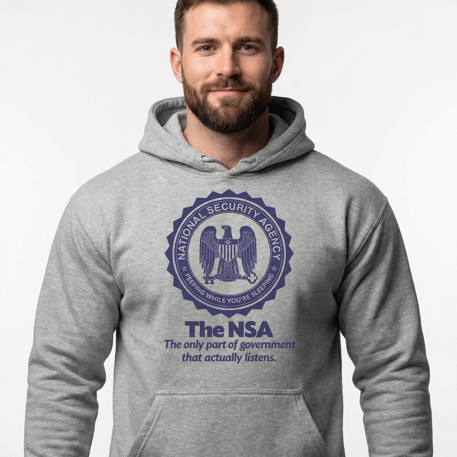 Man wearing a gray hoodie with NSA logo and text on a light gray background