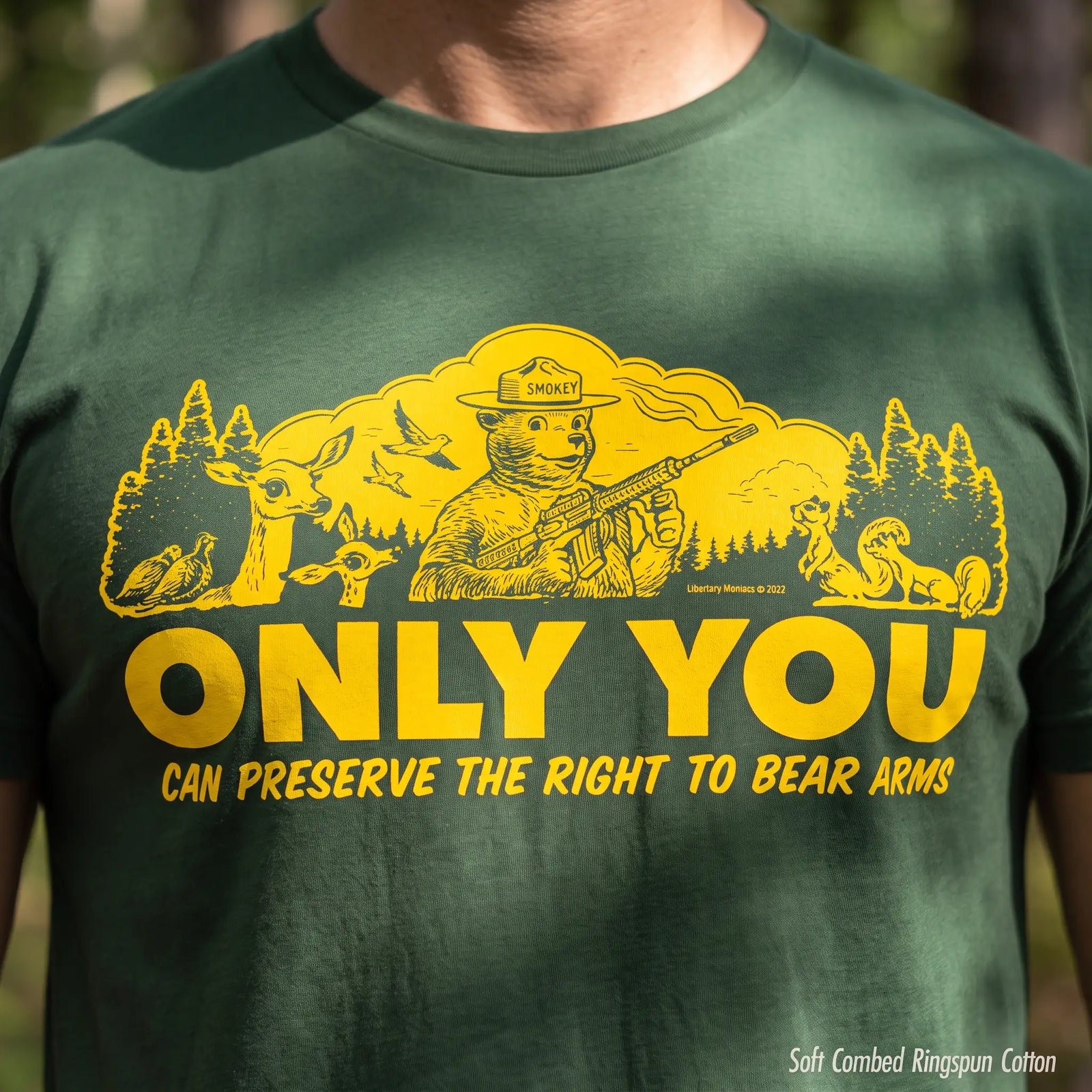 Retro Smokey-style bear holding a rifle in a forest with “Only You Can Preserve the Right to Bear Arms” text