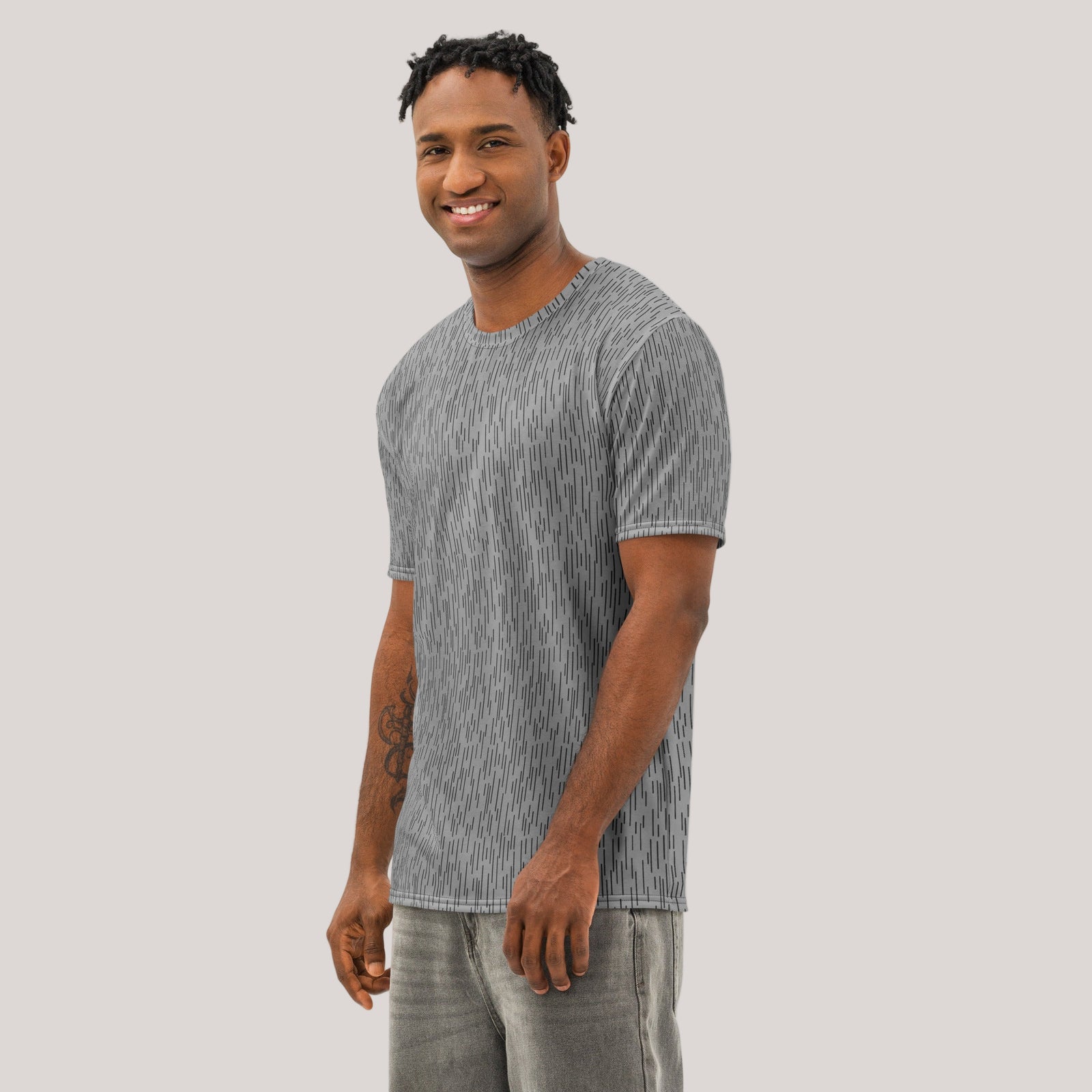 Man wearing a gray Strichtarn Line Camo Men’s T-Shirt on a white background