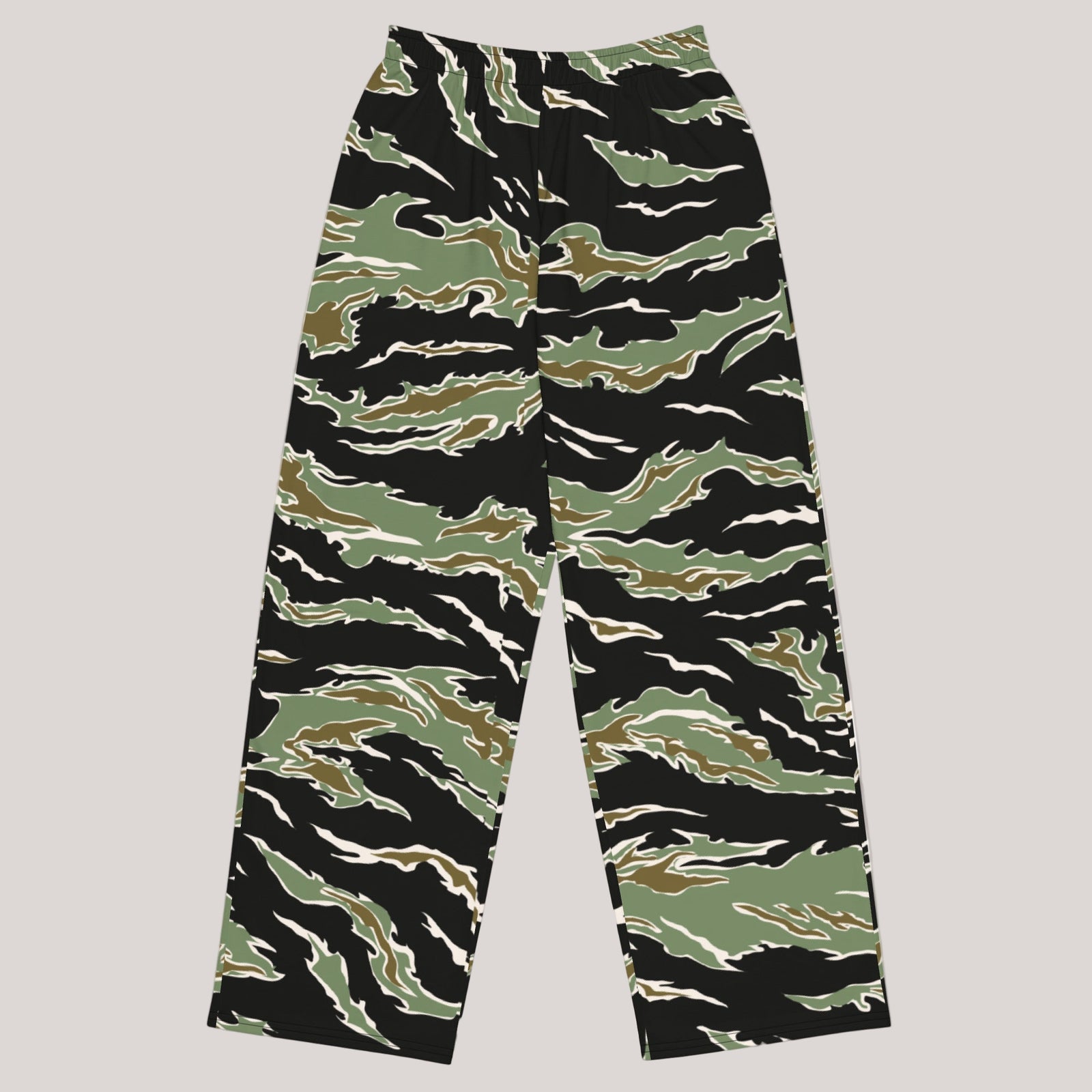 A pair of wide-leg lounge pants with a tiger stripe camouflage pattern.