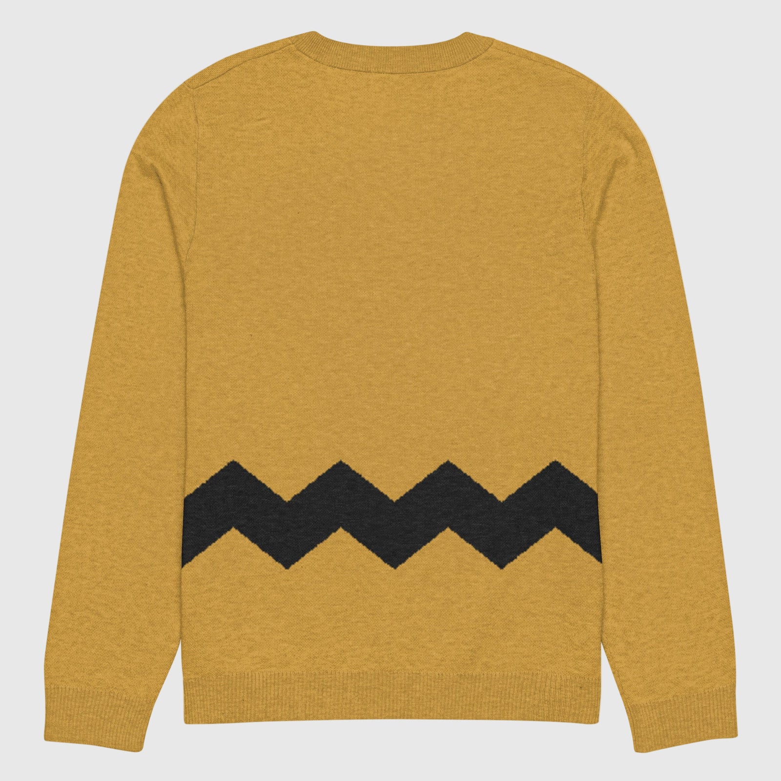 The back view of a Liberty Maniacs Charlie Brown inspired sweater with black zigzag pattern laying flat