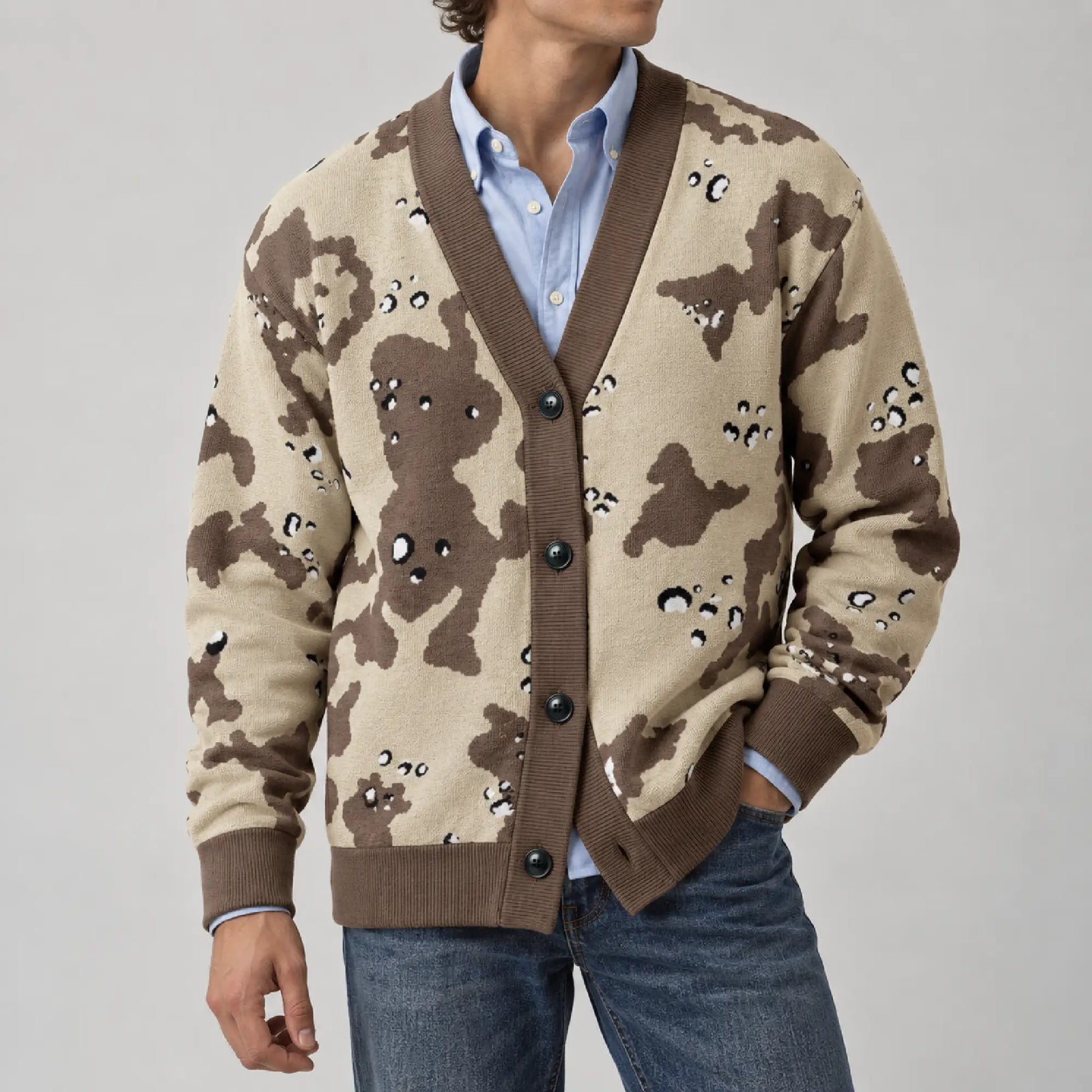 A man wearing the Liberty Maniacs Desert Storm Camo Knitted Cardigan sweater