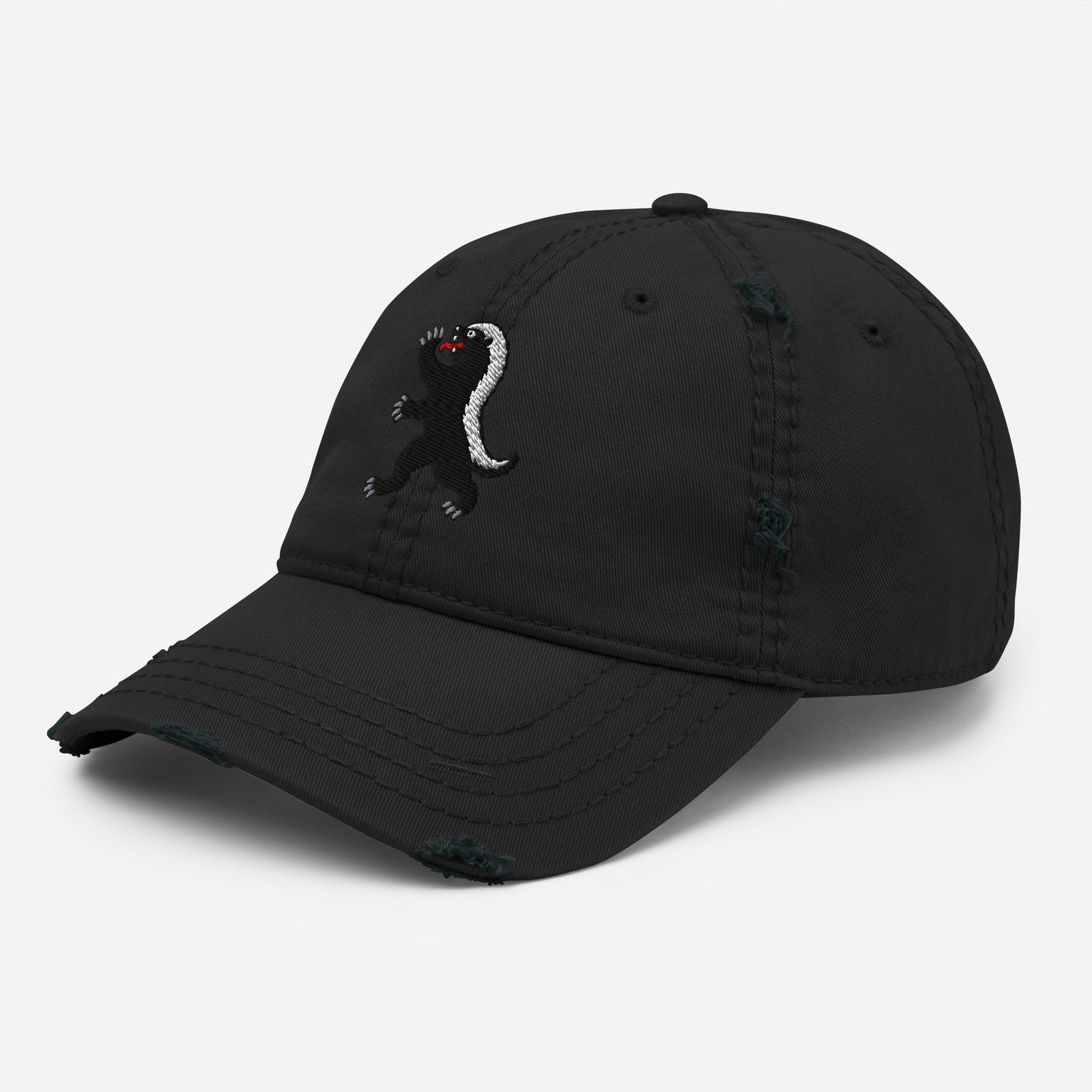 Black heraldic honey badger cap, angled front view showing embroidered emblem and frayed curved bill