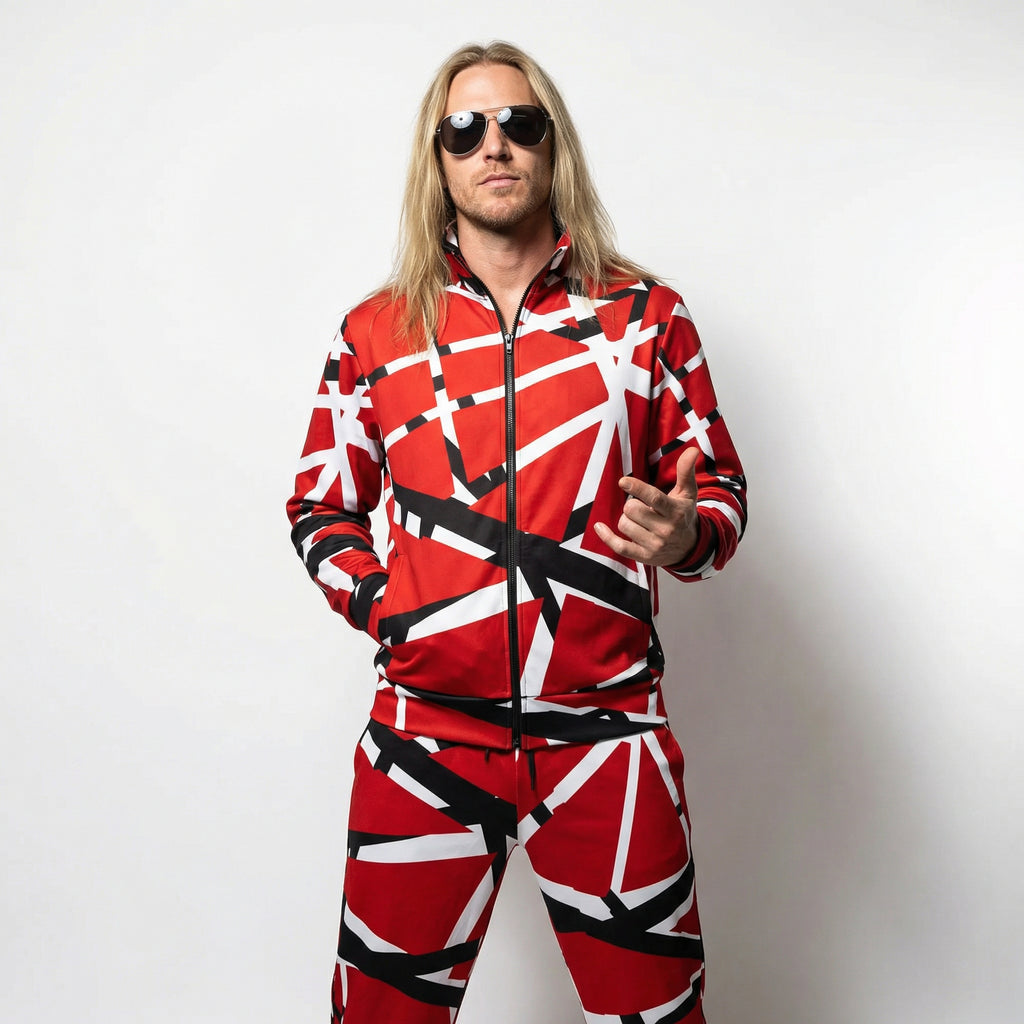 Person wearing a red and black patterned tracksuit against a white background