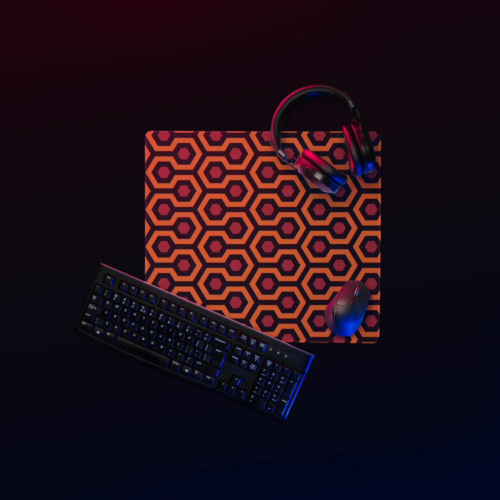Top view of the compact Overlook carpet mouse pad with keyboard, mouse, and headphones