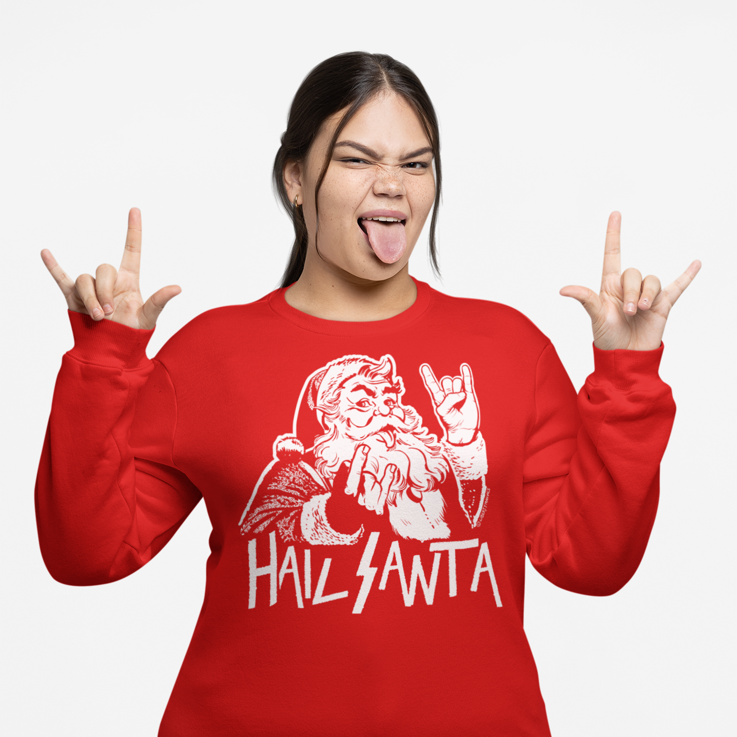 Person wearing a red sweatshirt with 'Hail Santa' graphic and making hand signs.