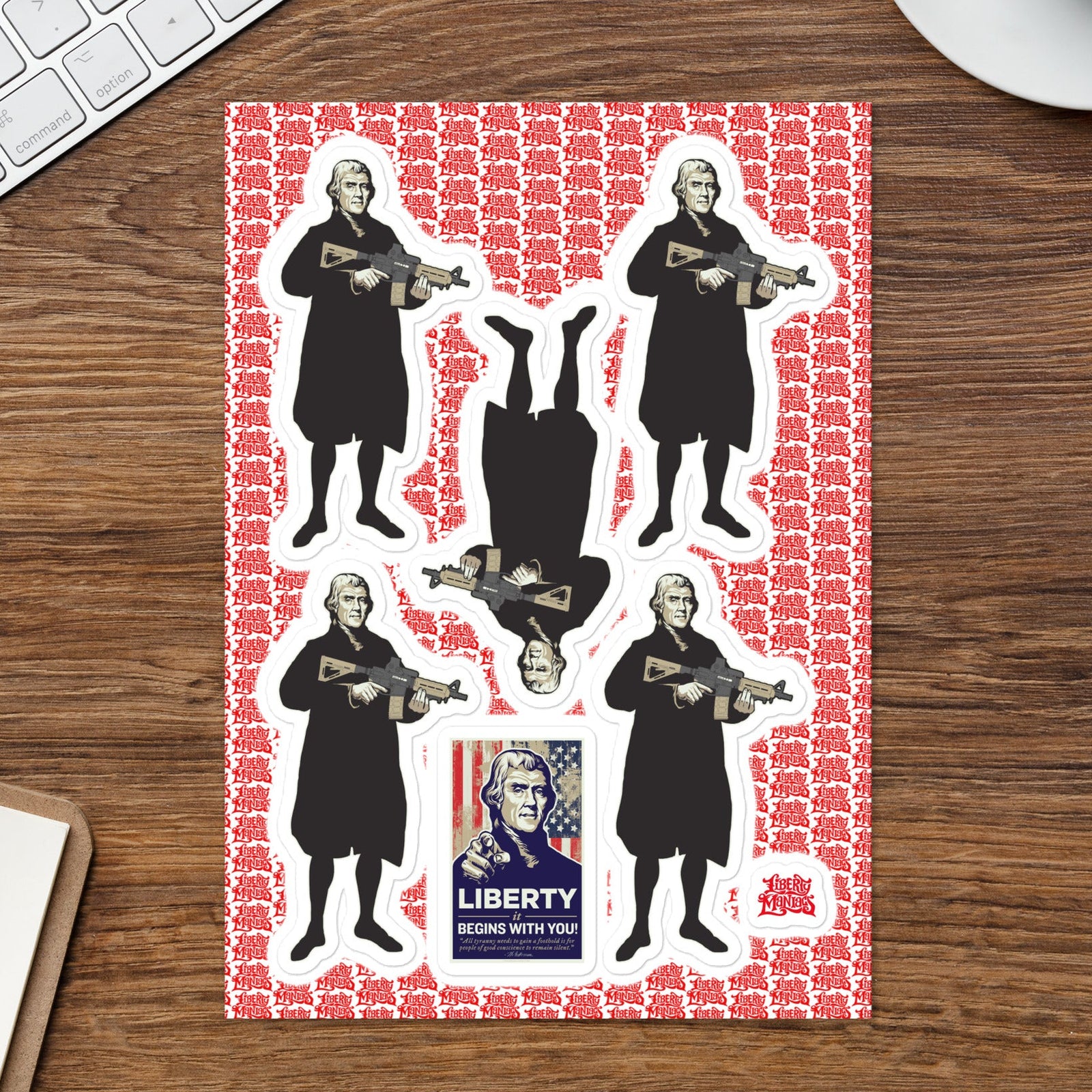 Thomas Jefferson holding an M4 carbine sticker sheet mockup with liberty satire artwork