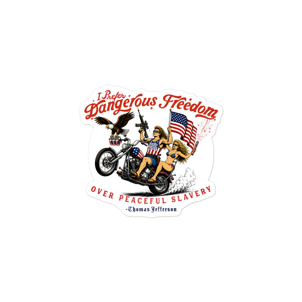A die-cut sticker featuring a vintage-style patriotic illustration with the text 'I Prefer Dangerous Freedom Over Peaceful Slavery' and '-Thomas Jefferson' at the bottom. The design shows a woman riding a motorcycle while holding an American flag, with an eagle and smoke effects, on a plain white background.