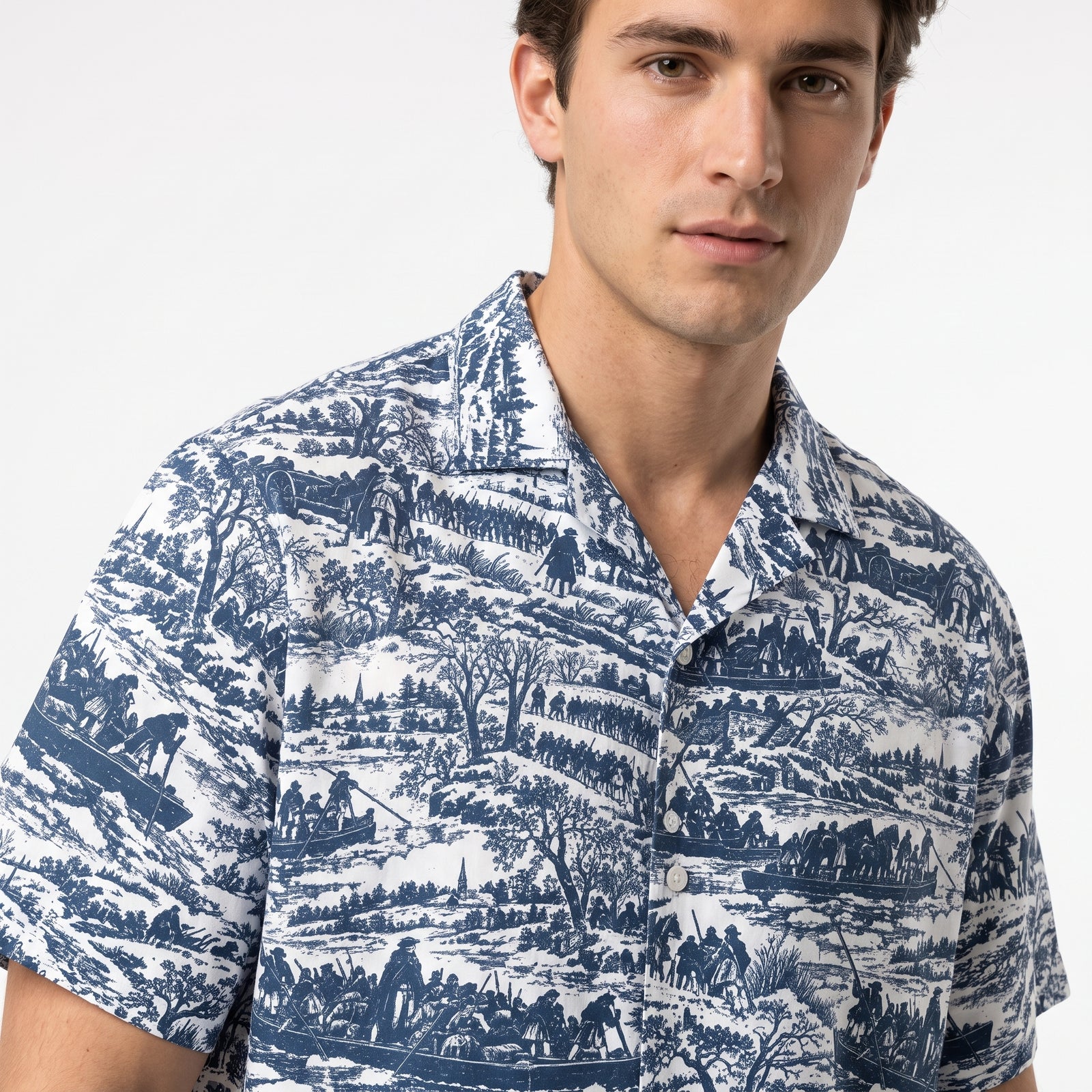 Close view of the blue-and-white Washington Crossing the Delaware toile shirt on a male model