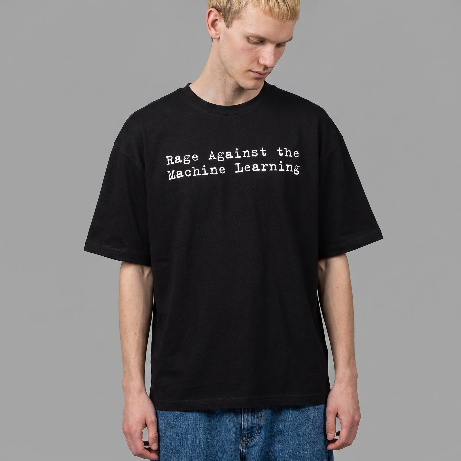 Man wearing the Rage Against the Machine Learning oversized black tee
