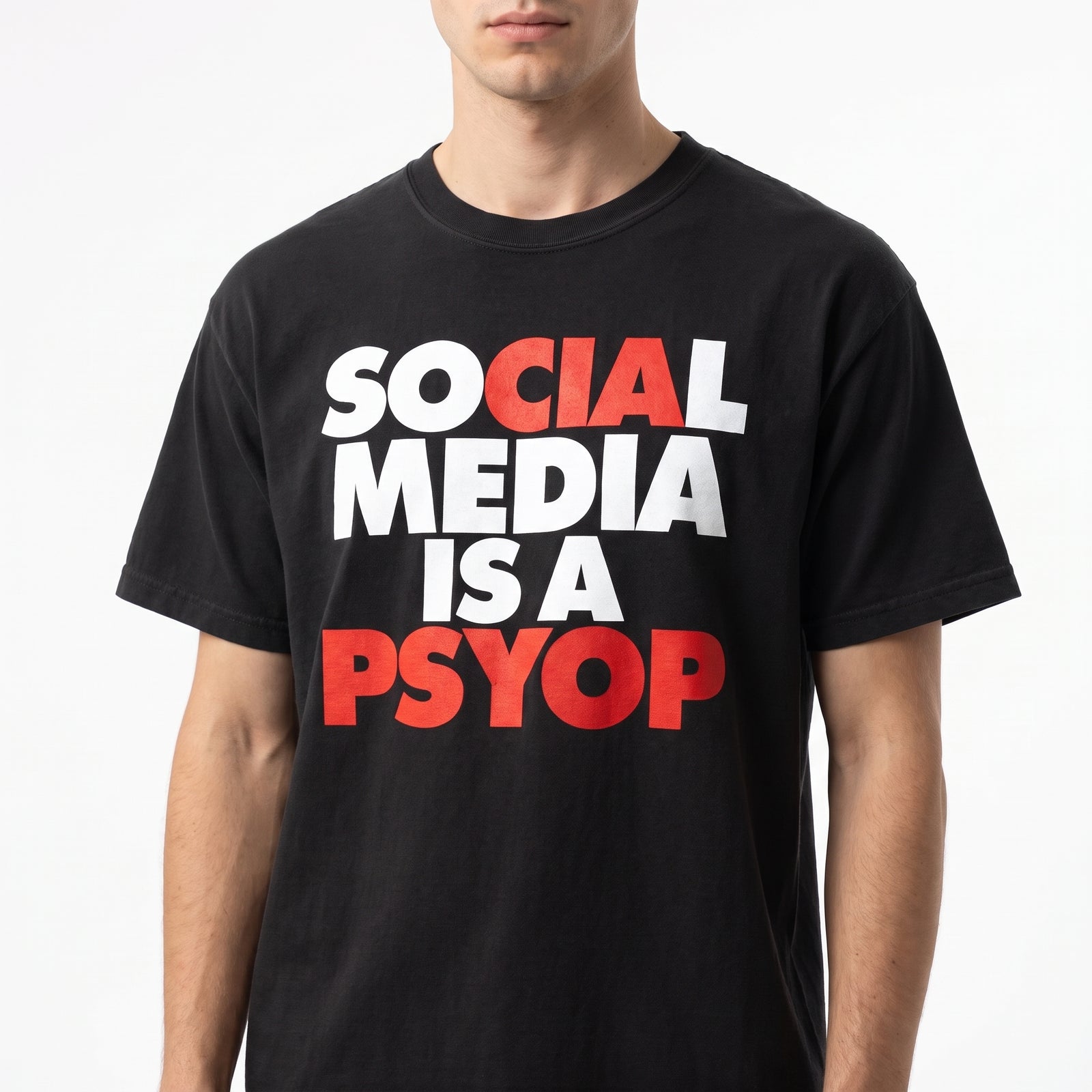 Model in a Social Media Is a Psyop black garment-dyed heavyweight T-shirt shown from the front