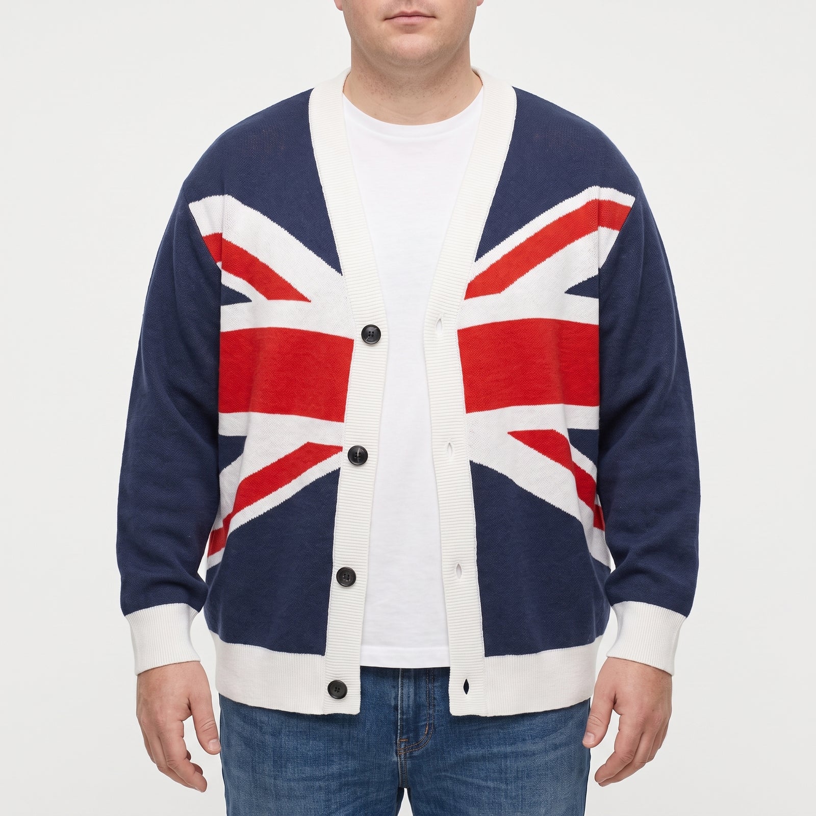 Man modeling the Union Jack knitted cardigan sweater in a studio, showing the relaxed unisex fit.