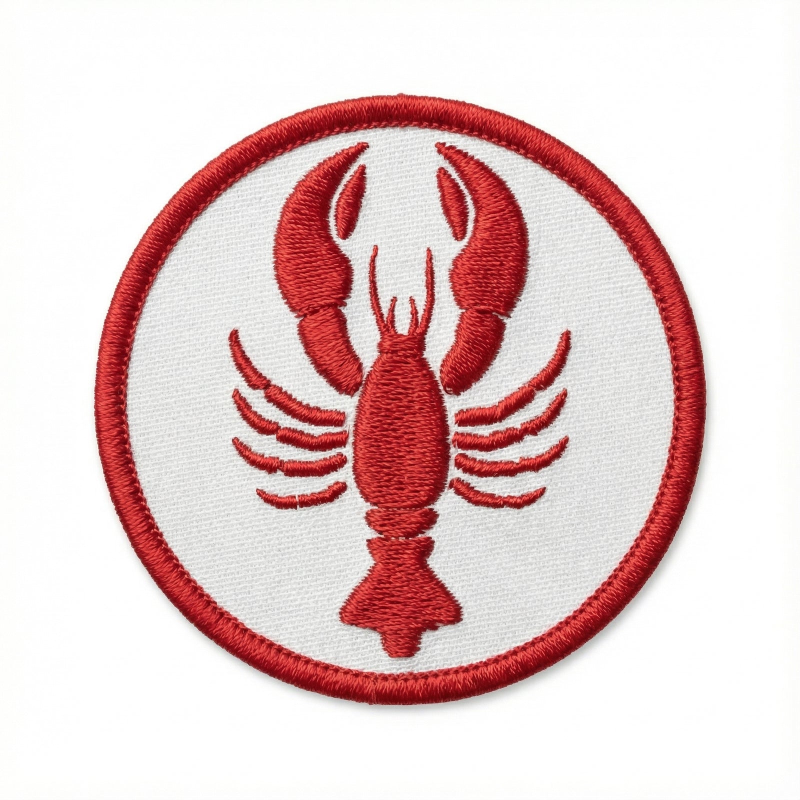 Red embroidered lobster patch on a white background