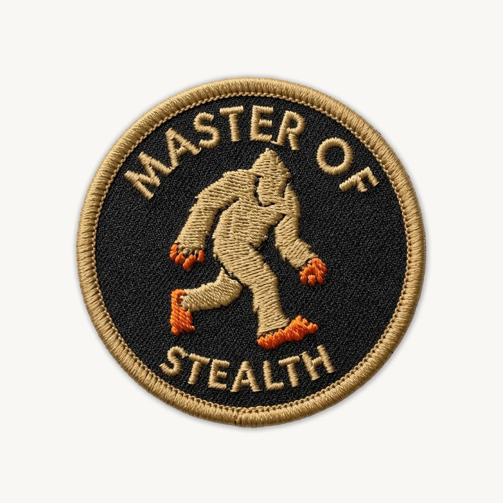 Patch with a Sasquatch silhouette and 'Master of Stealth' text on a black background