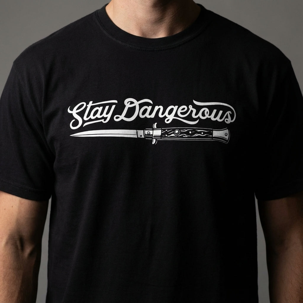 Black t-shirt with 'Stay Dangerous' graphic design on a gray background