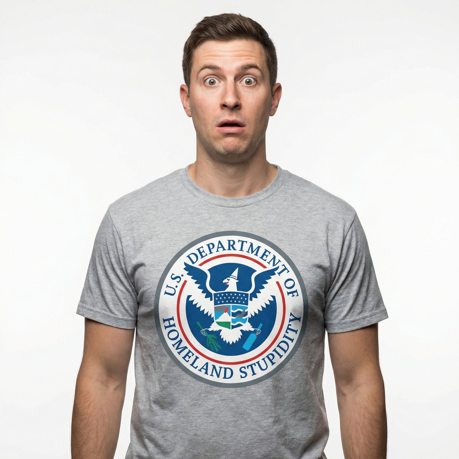 Person wearing a gray t-shirt with a humorous 'Department of Homeland Stupidity' logo.