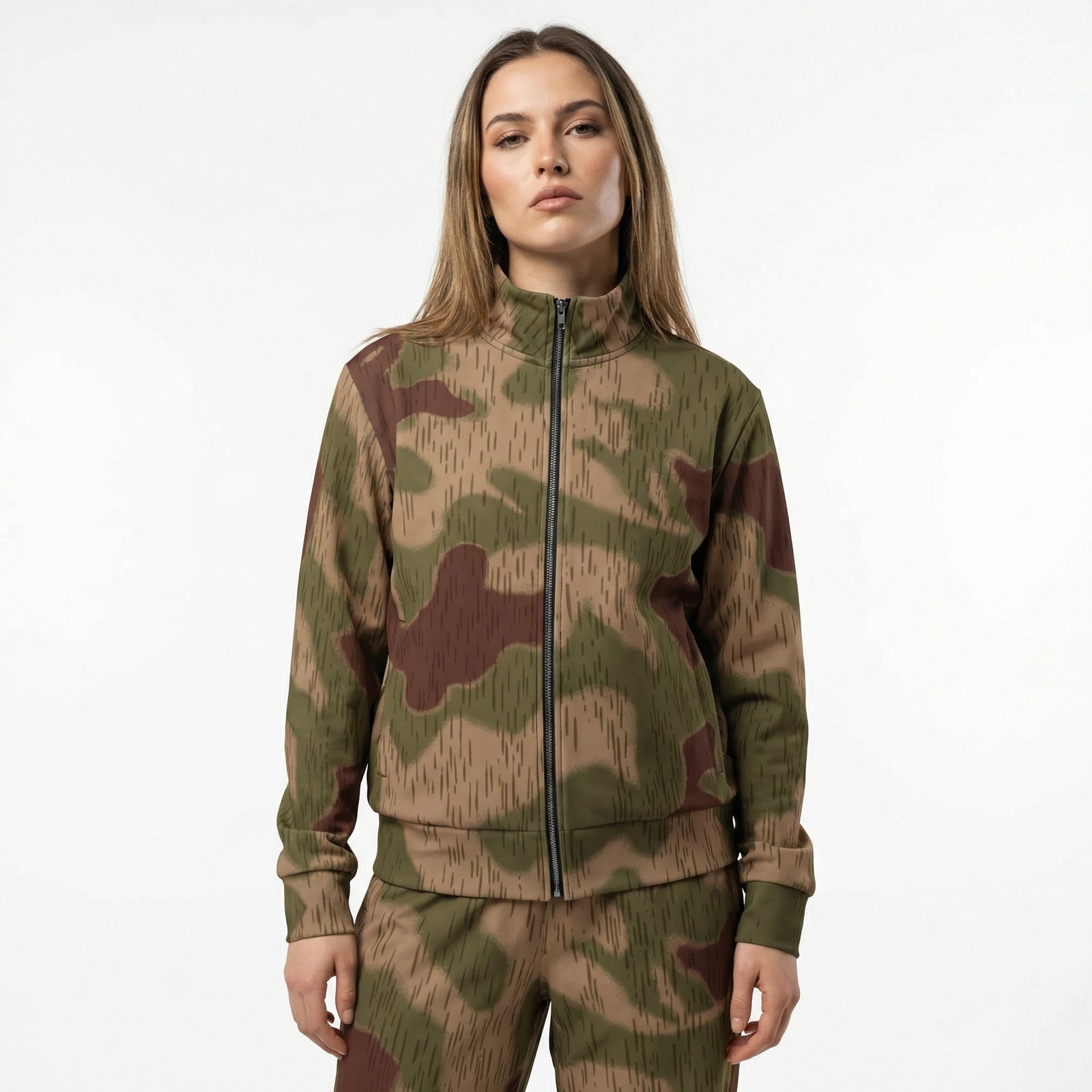 Person wearing a camouflage tracksuit on a white background