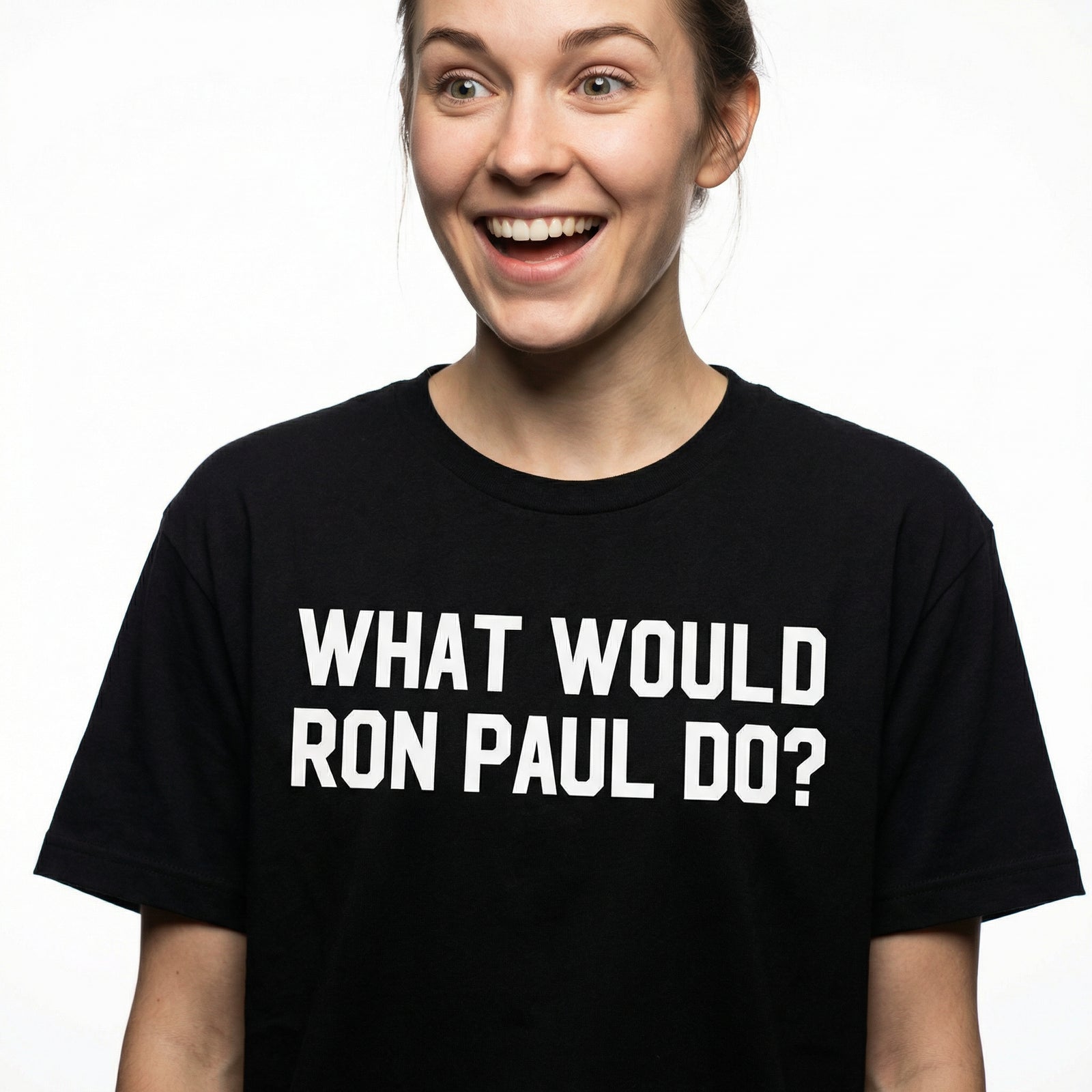 Woman wearing a black t-shirt with 'What Would Ron Paul Do?' text on a white background