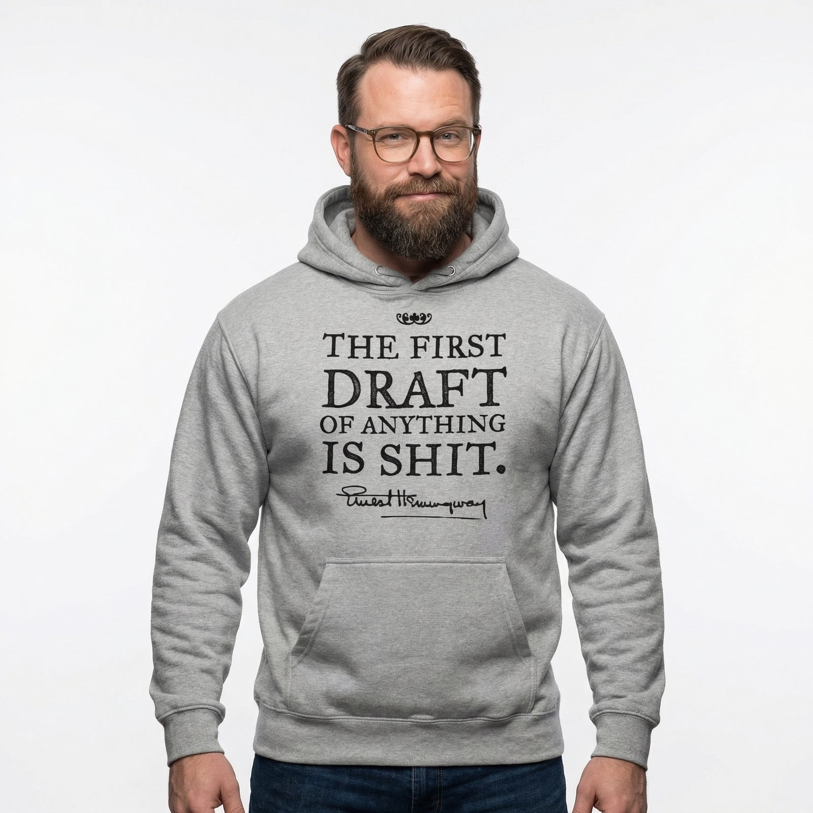 Man wearing a gray hoodie with text on a white background