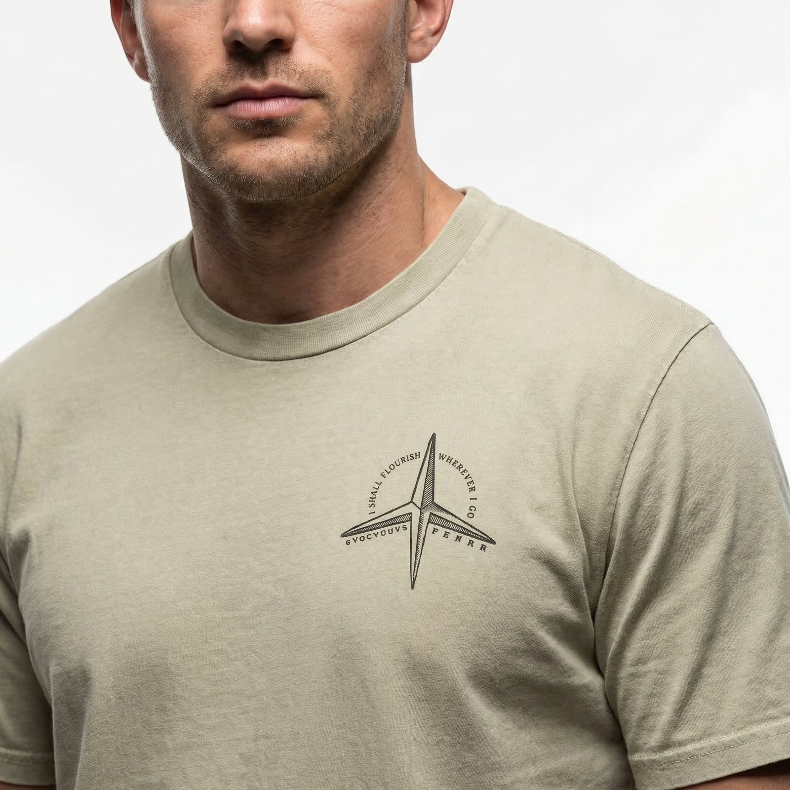 Man wearing a beige t-shirt with a logo on a white background