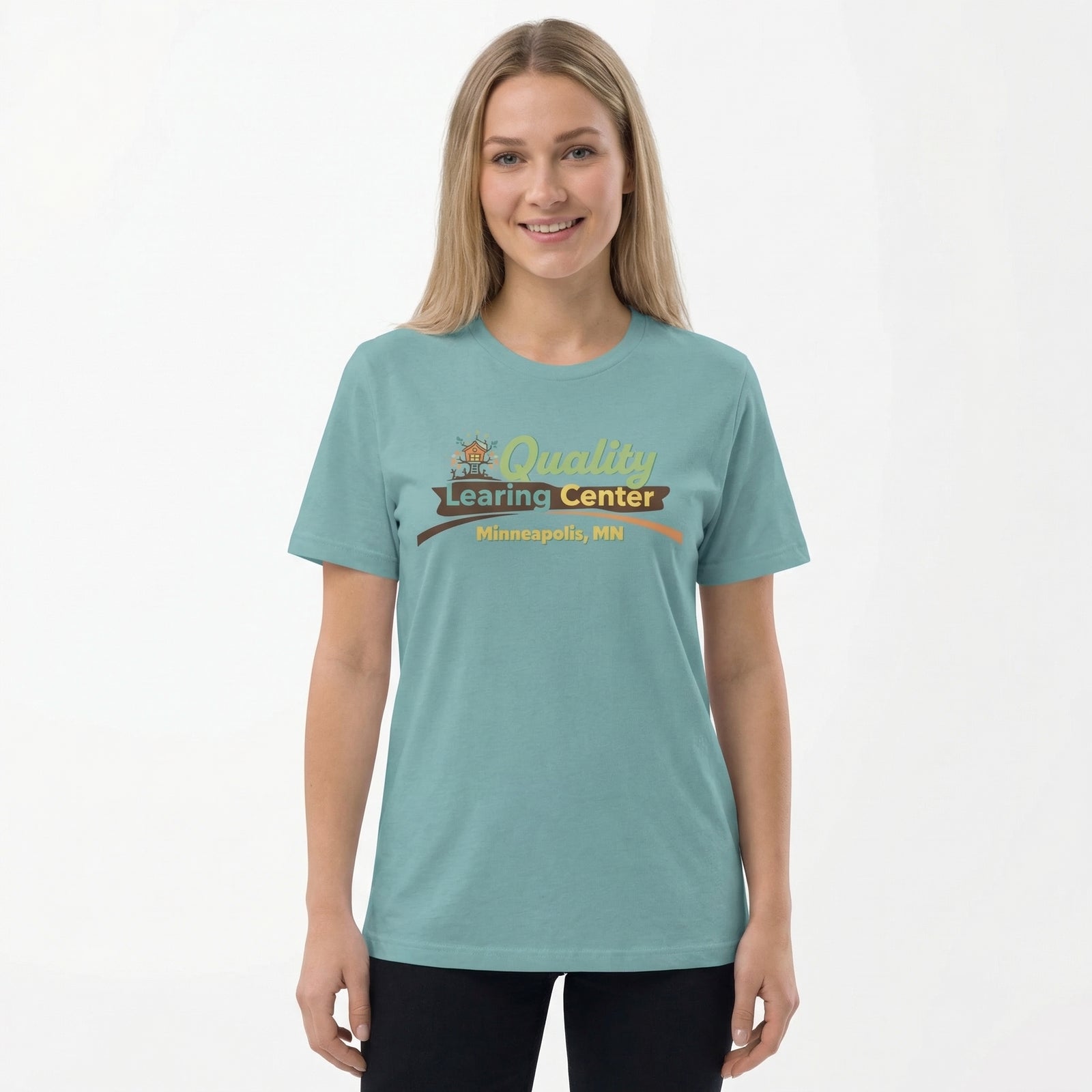 Woman wearing a teal t-shirt with 'Quality Learing Center' logo on a white background