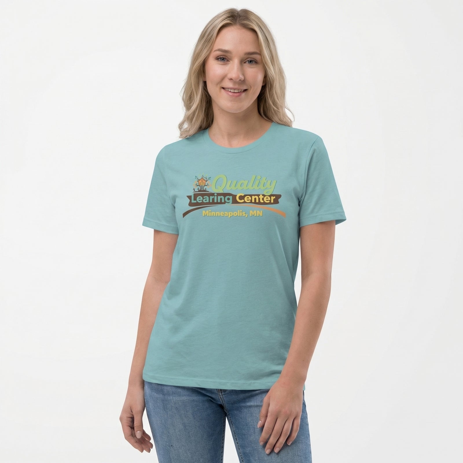 Woman wearing a teal t-shirt with 'Quality Learing Center' text on a white background