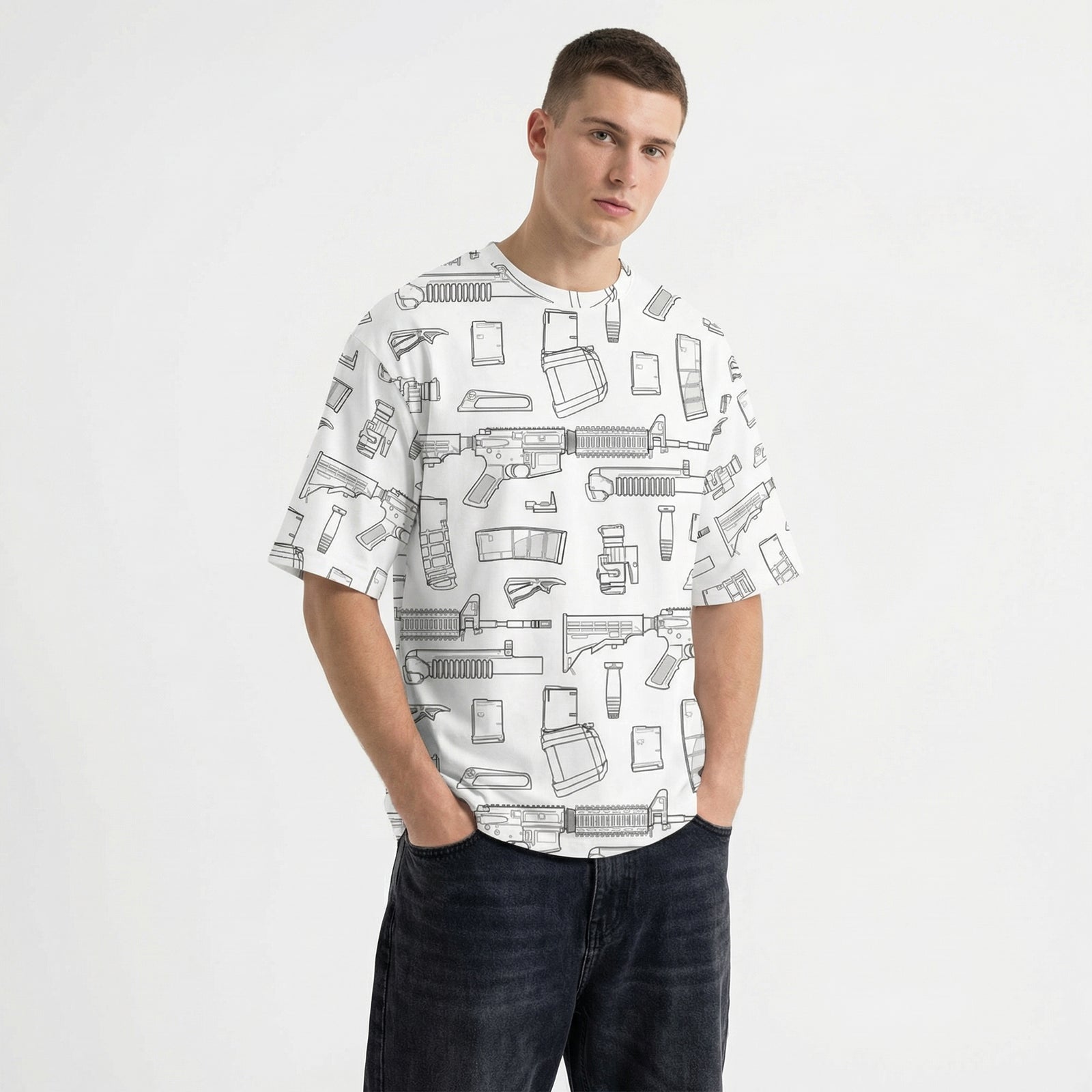 Person wearing a white t-shirt with black line art pattern on a plain background