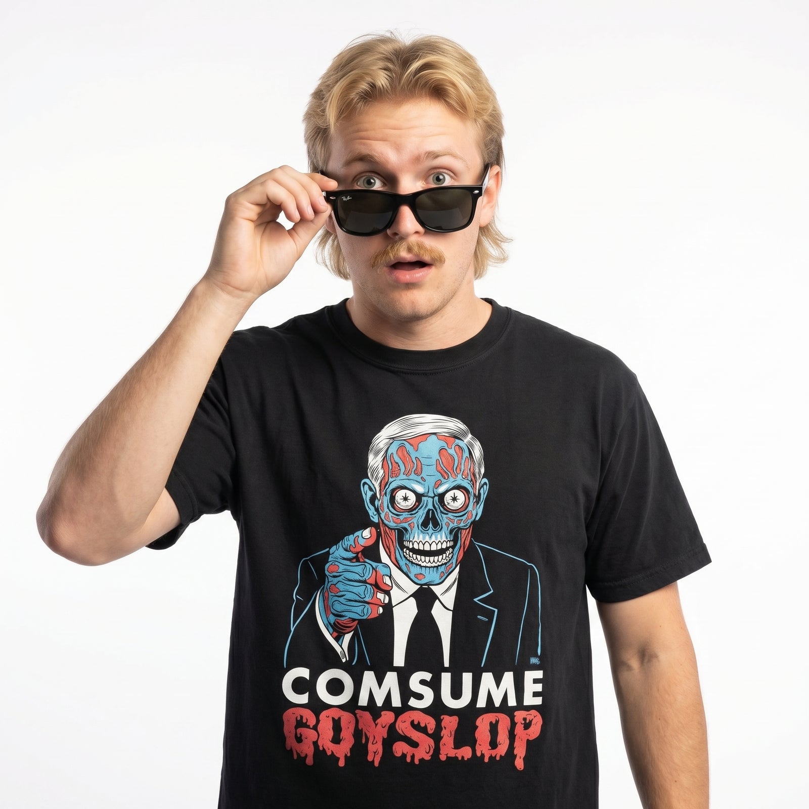 Person wearing a black t-shirt with a graphic design and text, holding sunglasses.