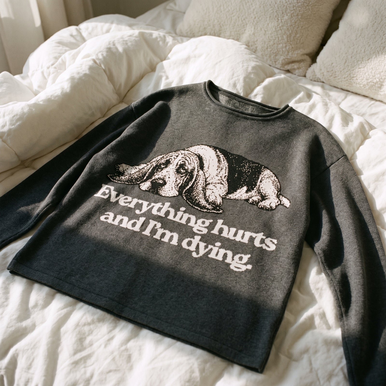 Everything Hurts and I'm Dying women's knit sweater, charcoal gray, basset hound graphic, flat lay front view