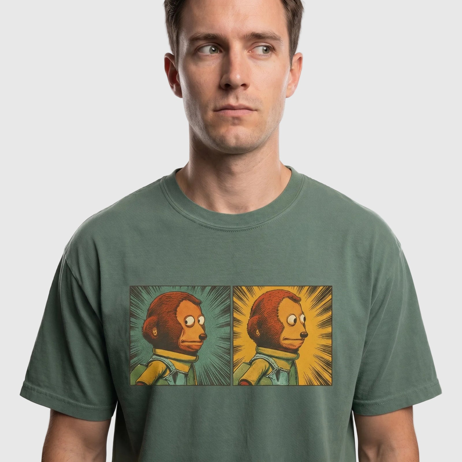 garment-dyed graphic T-shirt featuring a two-panel vintage comic-style monkey making an awkward side-eye expression.