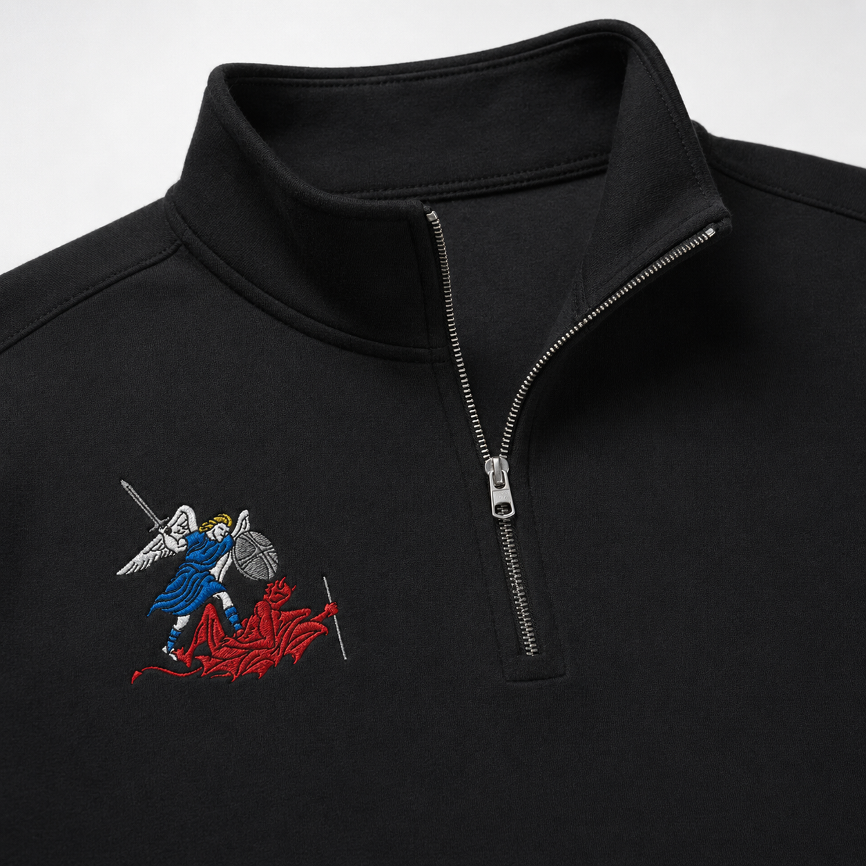 Black quarter-zip sweatshirt with embroidered design on the chest against a white background