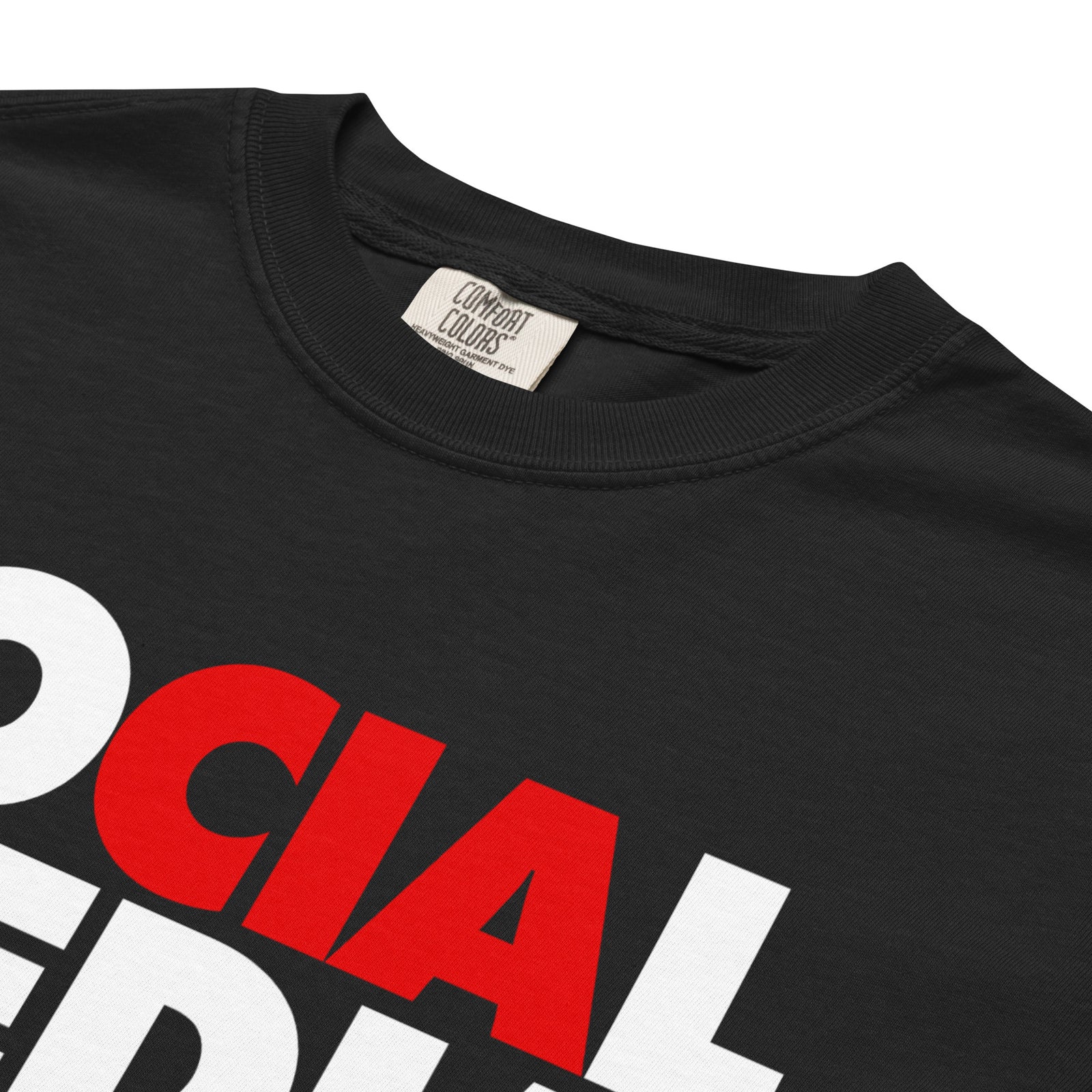 Detail view of the Social Media Is a Psyop red and white typographic shirt design