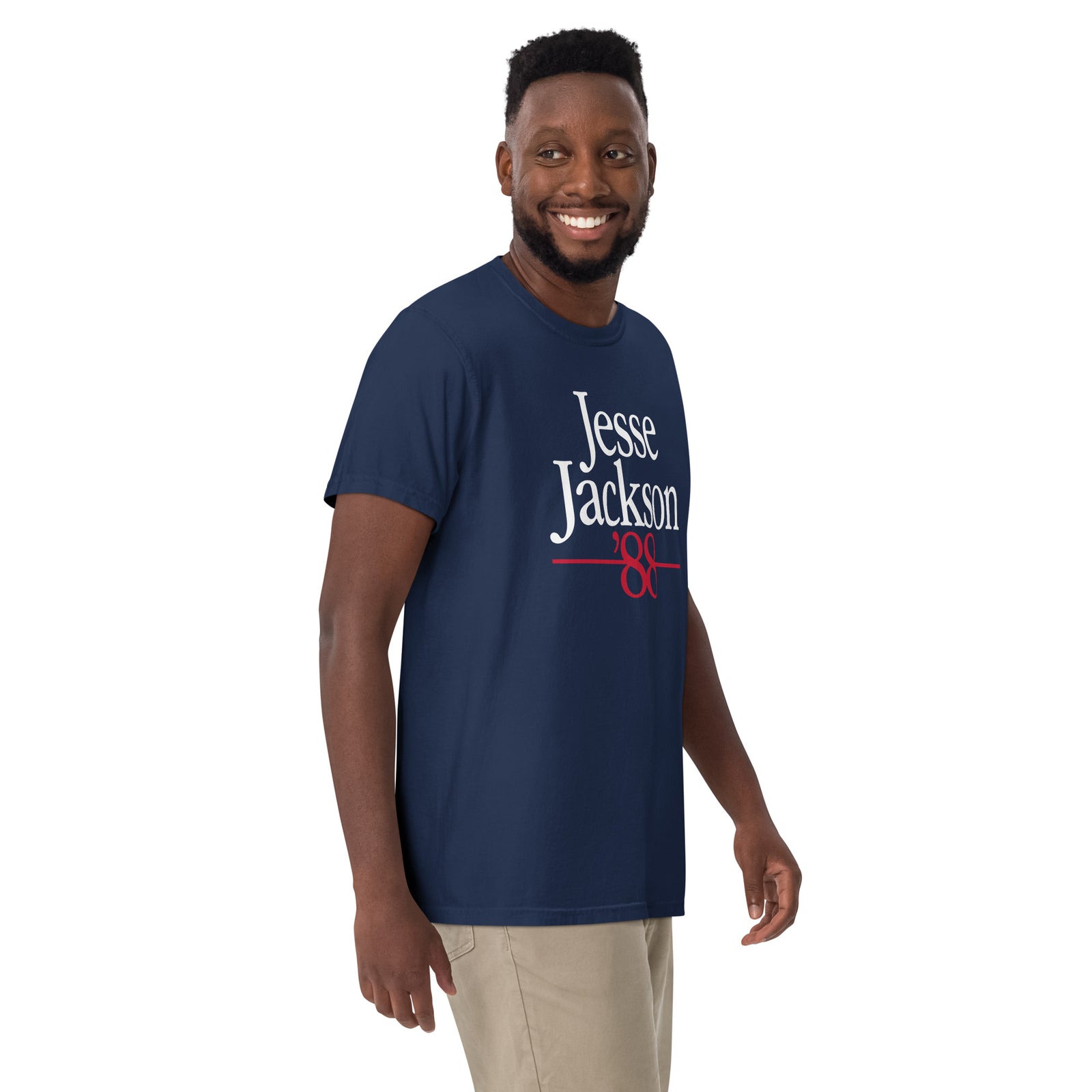 Man wearing a navy blue t-shirt with 'Jesse Jackson' printed on it against a white background