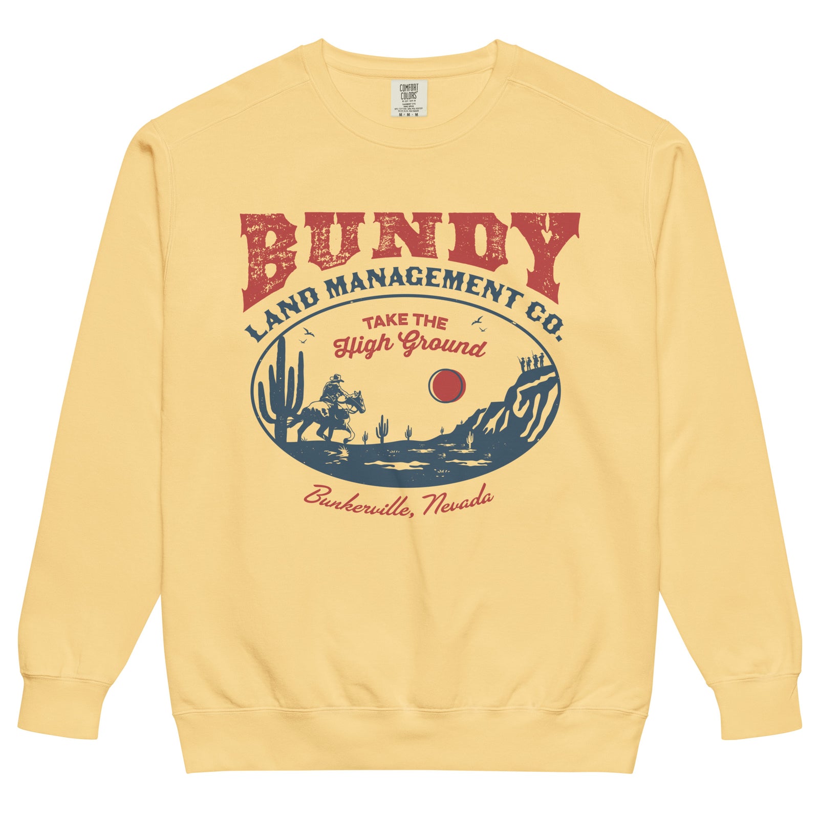 A yellow garment-dyed crewneck sweatshirt with the Bundy Land Management Co. emblem printed on the front.
