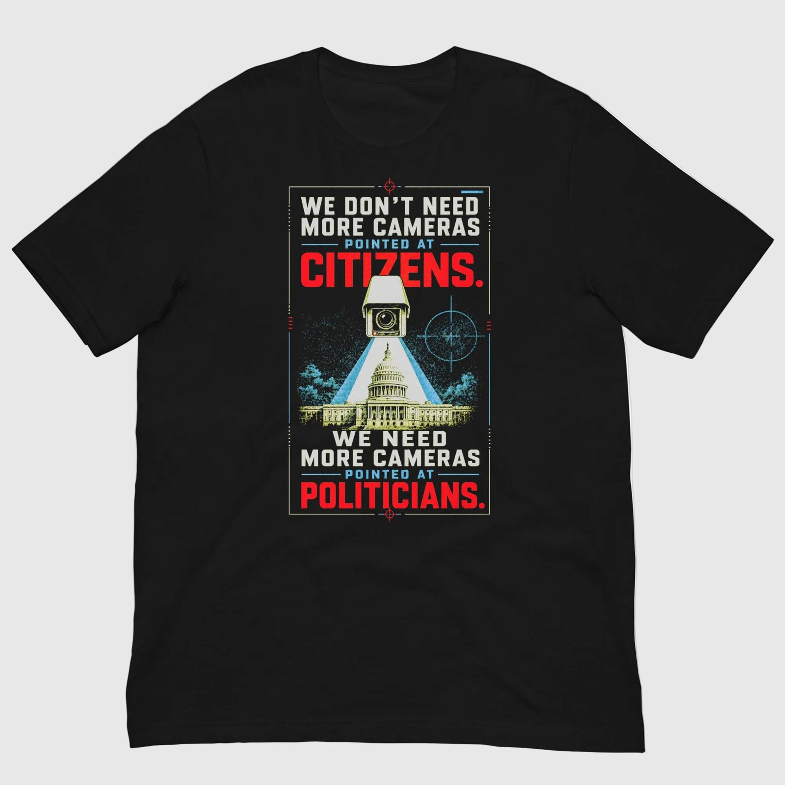 Black t-shirt with a graphic and text about cameras pointed at citizens and politicians on a white background.