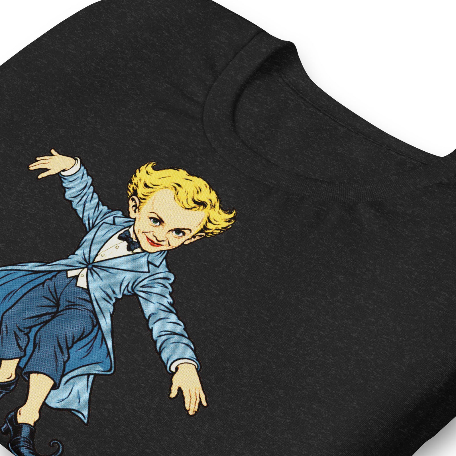 Close-up of the Rumpelstiltskin illustration on a Black Heather T-shirt, showing the face, blue coat and cotton texture.