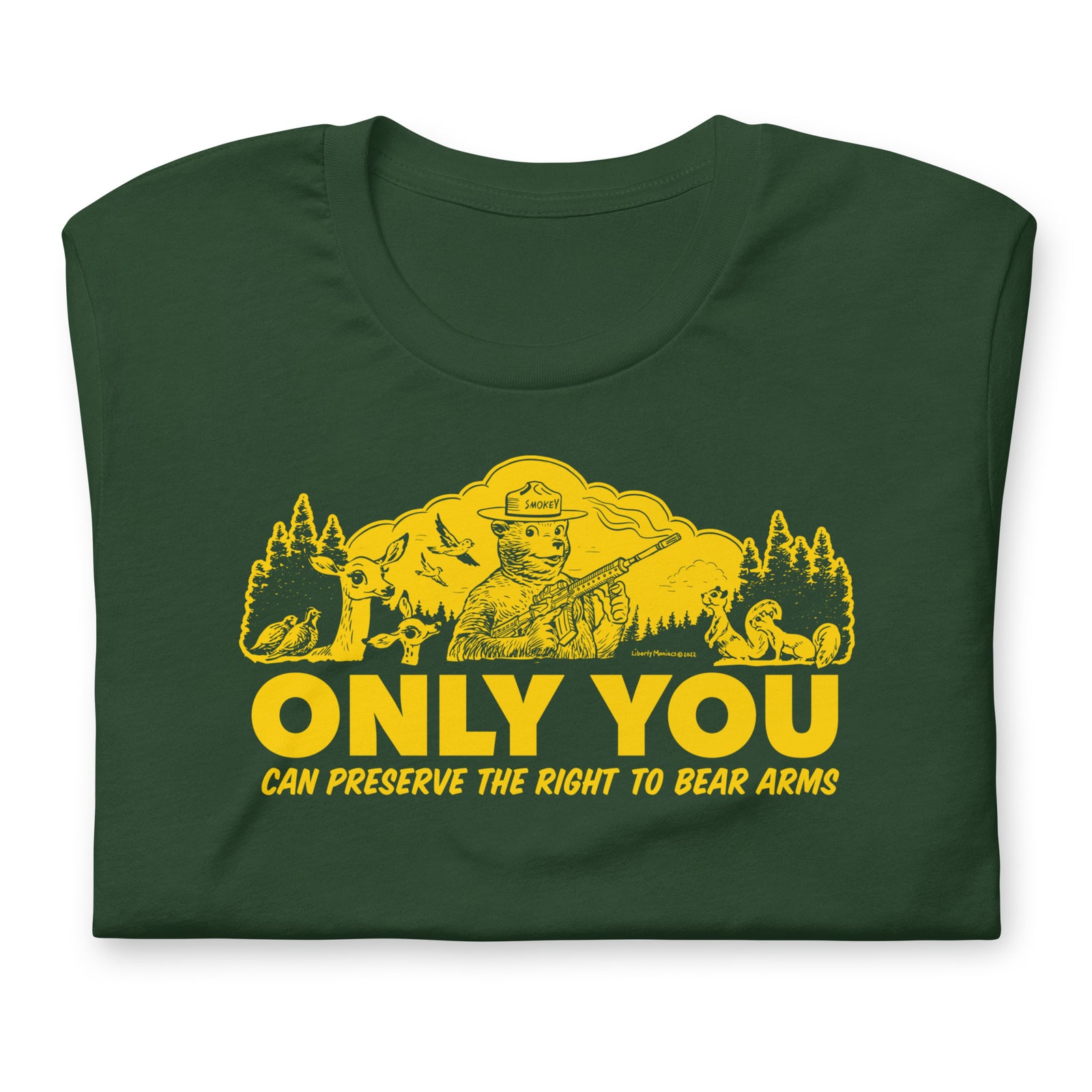 Folded forest green T-shirt with retro armed bear forest graphic and right to bear arms slogan