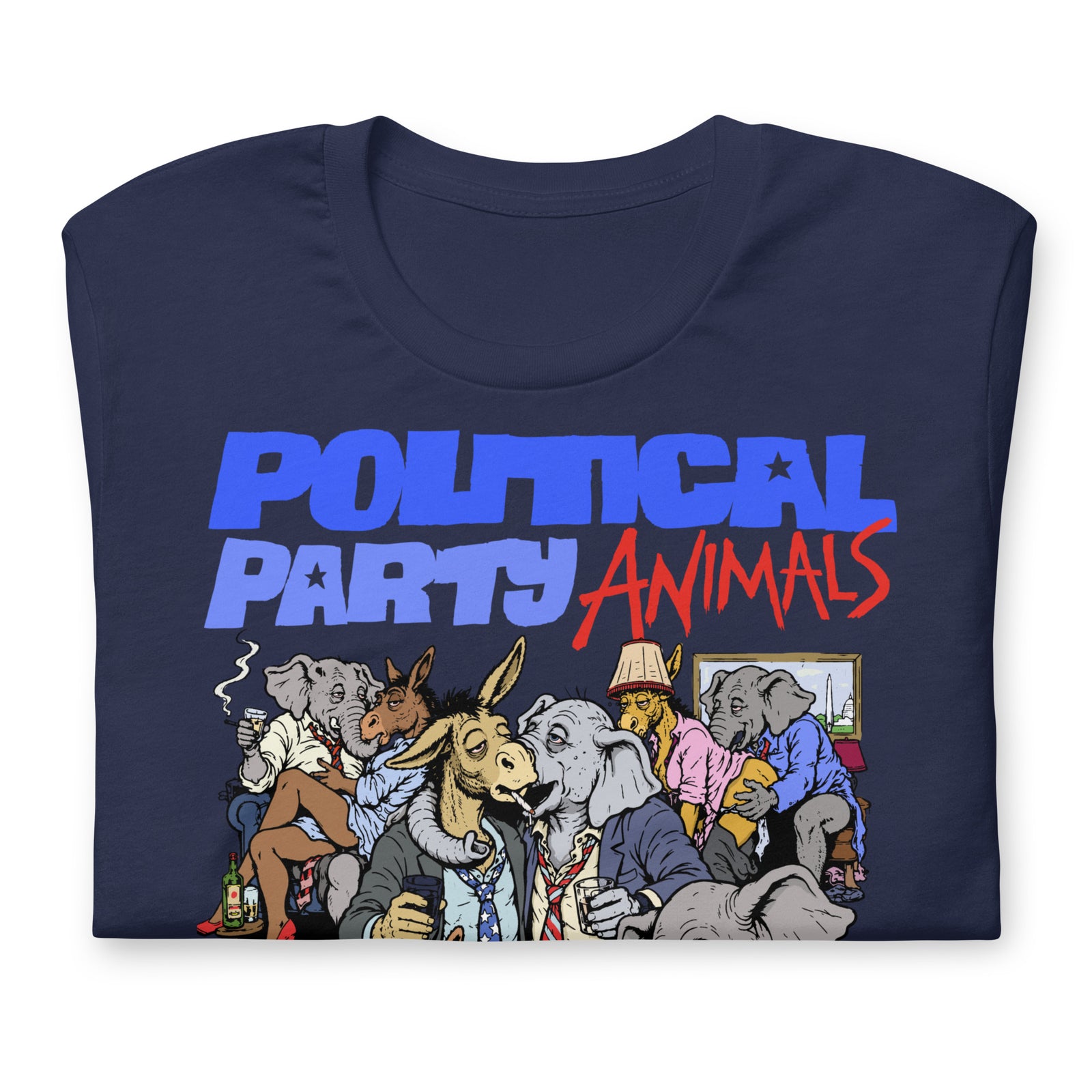 A navy blue folded t-shirt featuring a colorful graphic print with the text 'POLITICAL PARTY ANIMALS' and cartoon illustrations of various political animals like donkeys, elephants, and a donkey riding a donkey, shown on a plain white background.