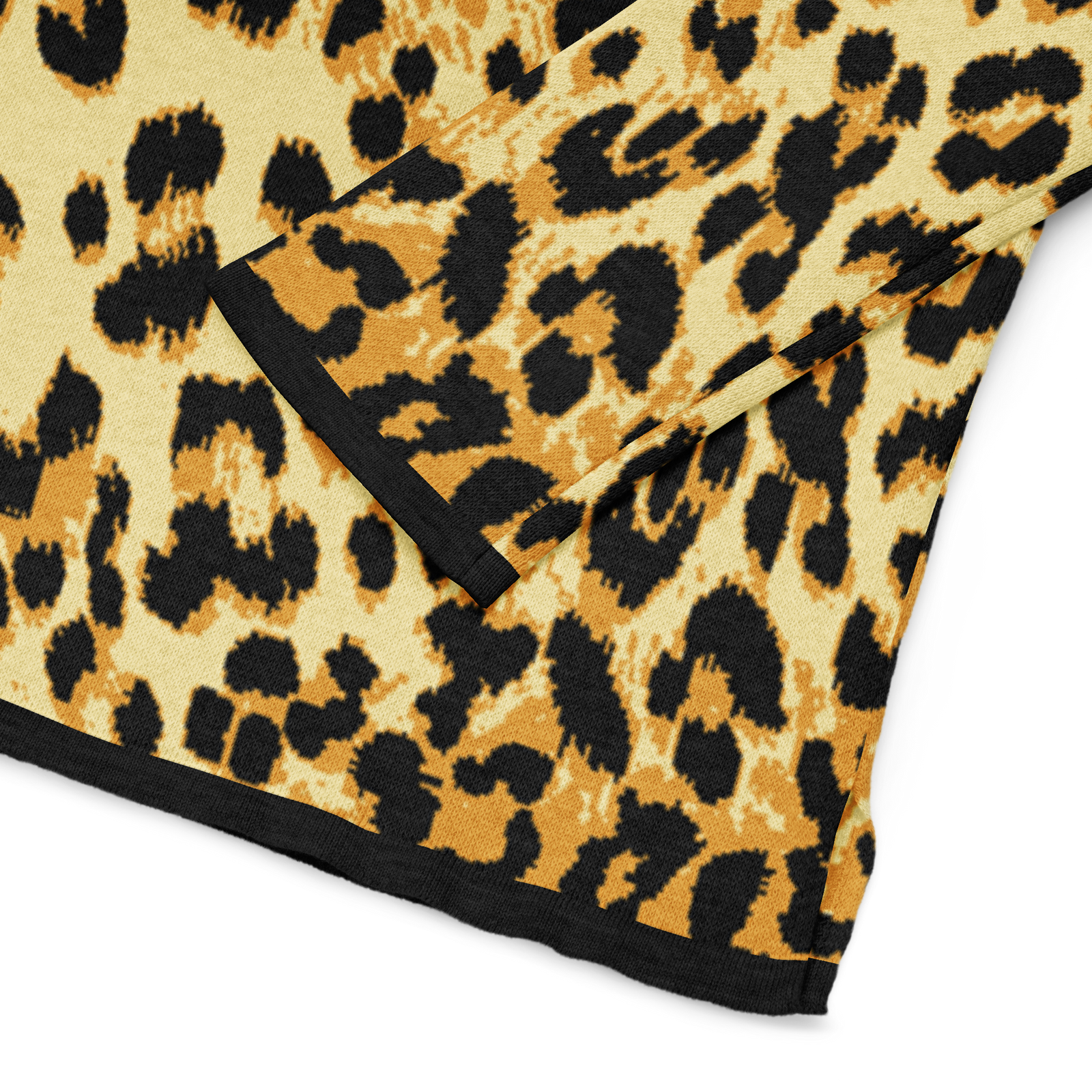 Leopard print fabric with a black border on a white background