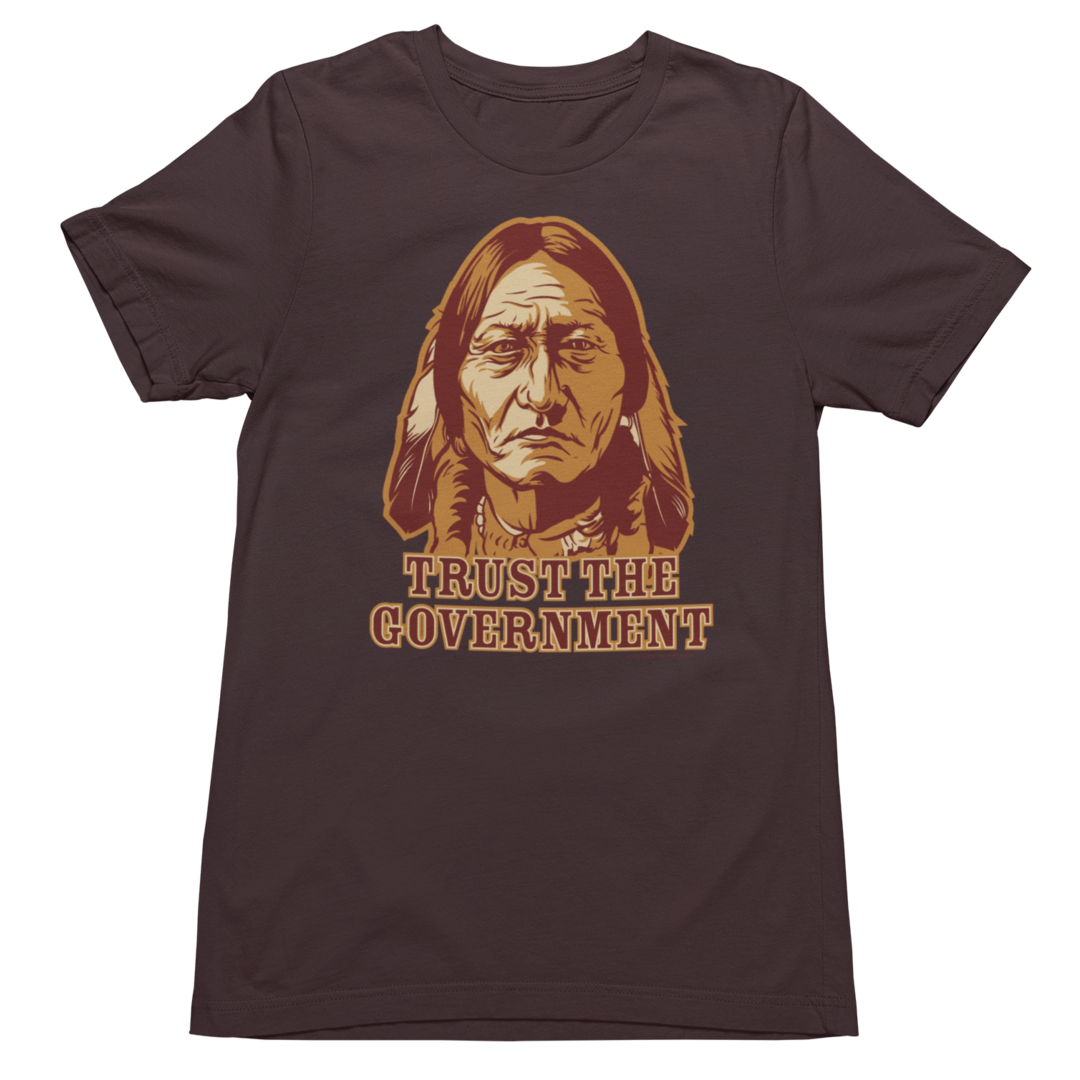 A brown crew neck men's t-shirt with the text 'TRUST THE GOVERNMENT' and an illustration of Sitting Bull.