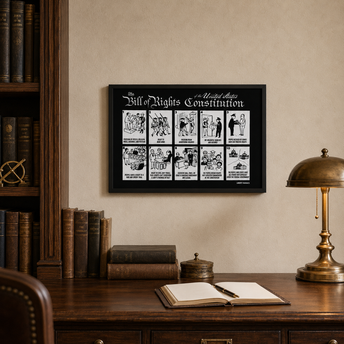 A framed black-and-white 'Bill of Rights Constitution' wall art print hangs on a beige wall above a wooden desk with books, an open notebook, and a brass lamp in a study setting.