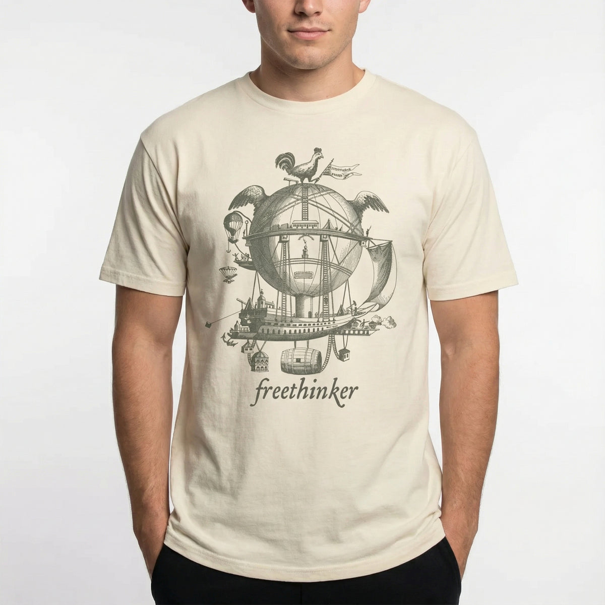 Person wearing a beige t-shirt with a graphic design and the word &#39;freethinker&#39; on a white background