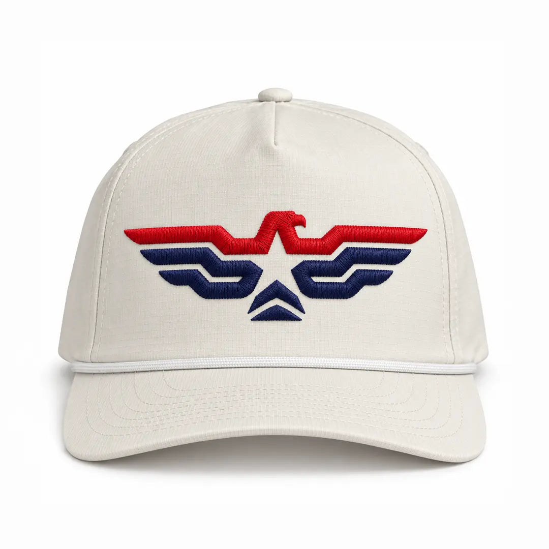 Liberty Maniacs Eagle Embroidered Sunwashed Rope Cap in Ivory, front view with red and navy raised eagle embroidery and white rope trim