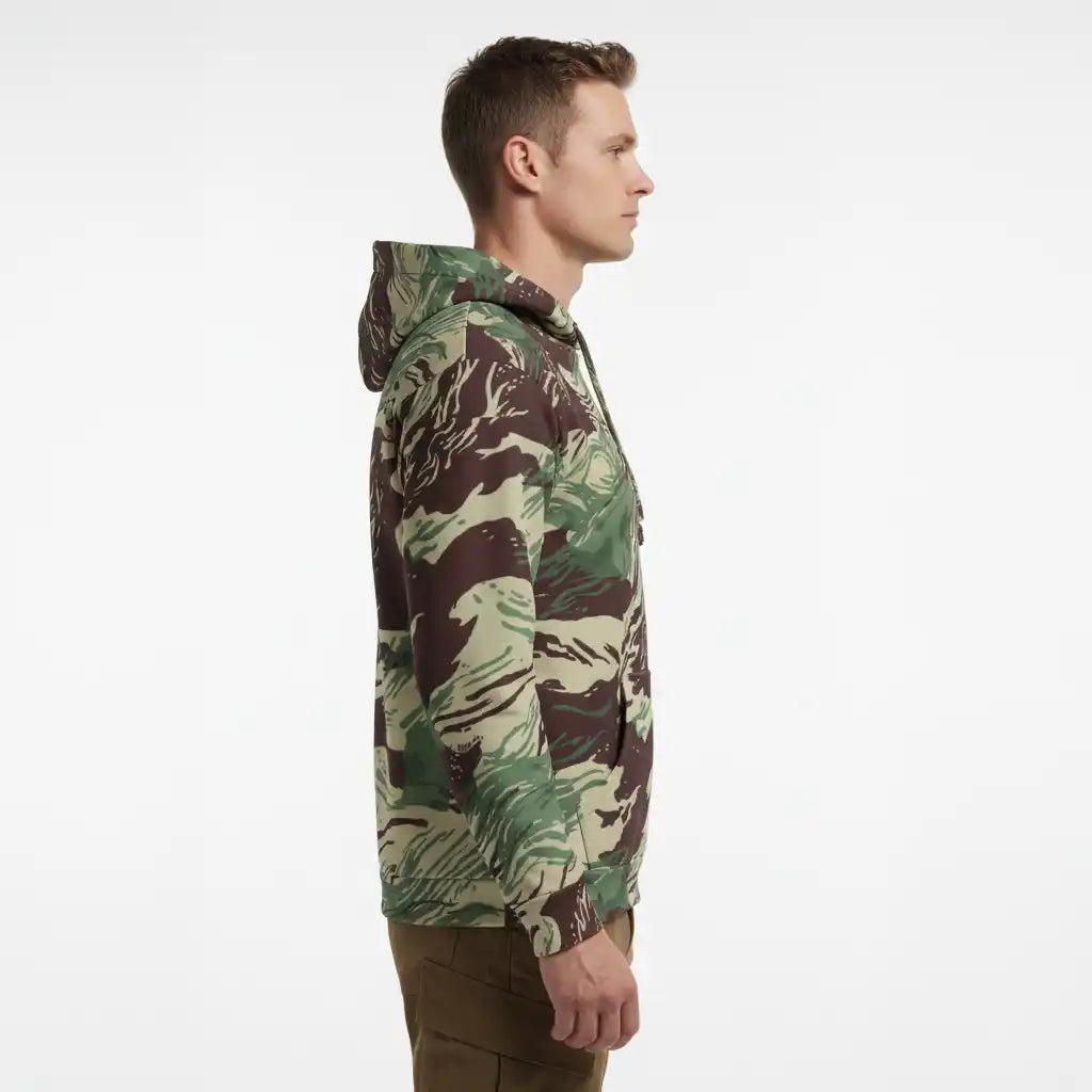 Man wearing a Rhodesian Brushstroke Camo Cotton Hoodie by Liberty Maniacs