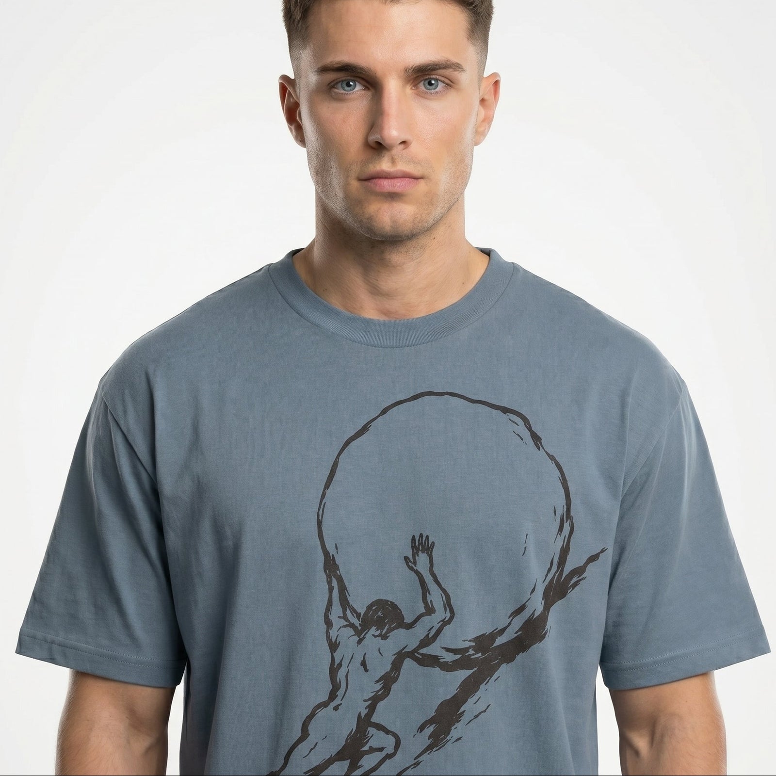 Man wearing a Sisyphus Garment Dyed blue Organic Graphic T-Shirt from Liberty Maniacs