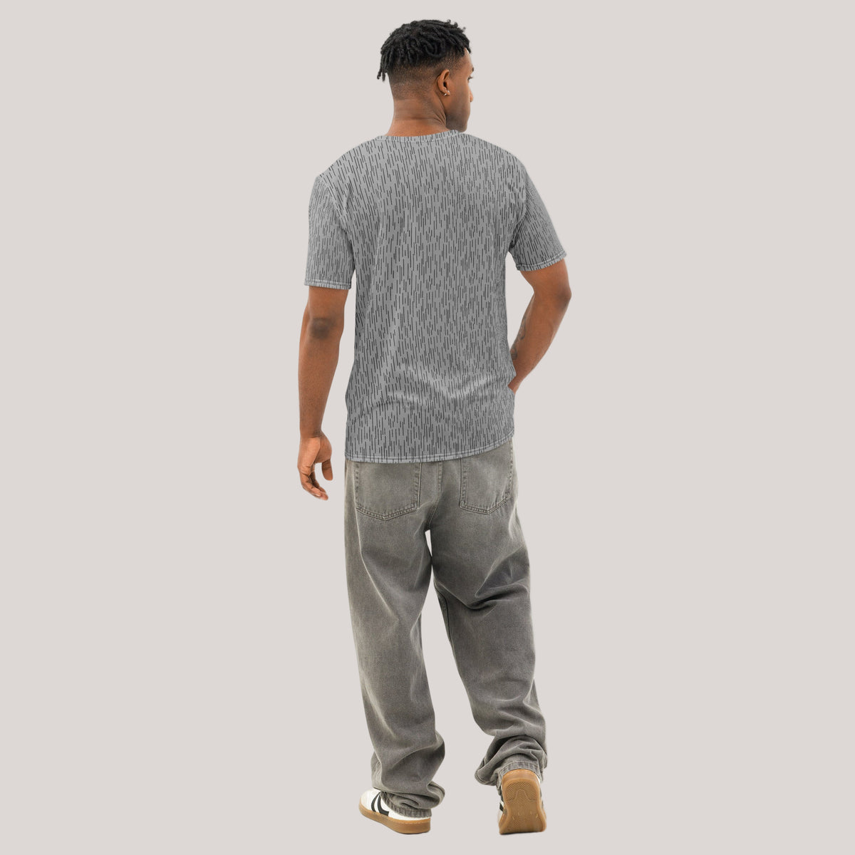 Man wearing a gray patterned Strichtarn Line Camo Men’s T-Shirt
