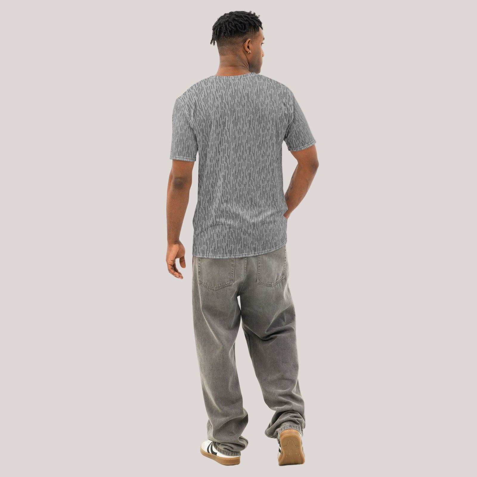 Man wearing a gray patterned Strichtarn Line Camo Men’s T-Shirt