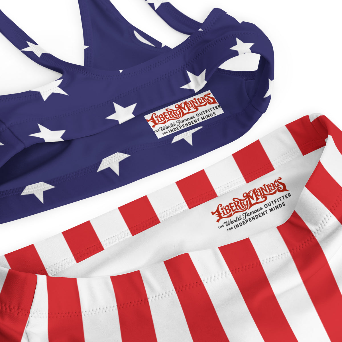 Two pieces of swimwear with American flag design and Liberty Maniacs branding.