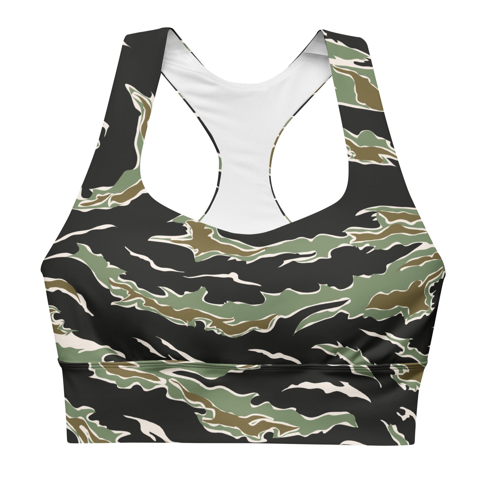 Woman wearing a camouflage sports bra against a gray background