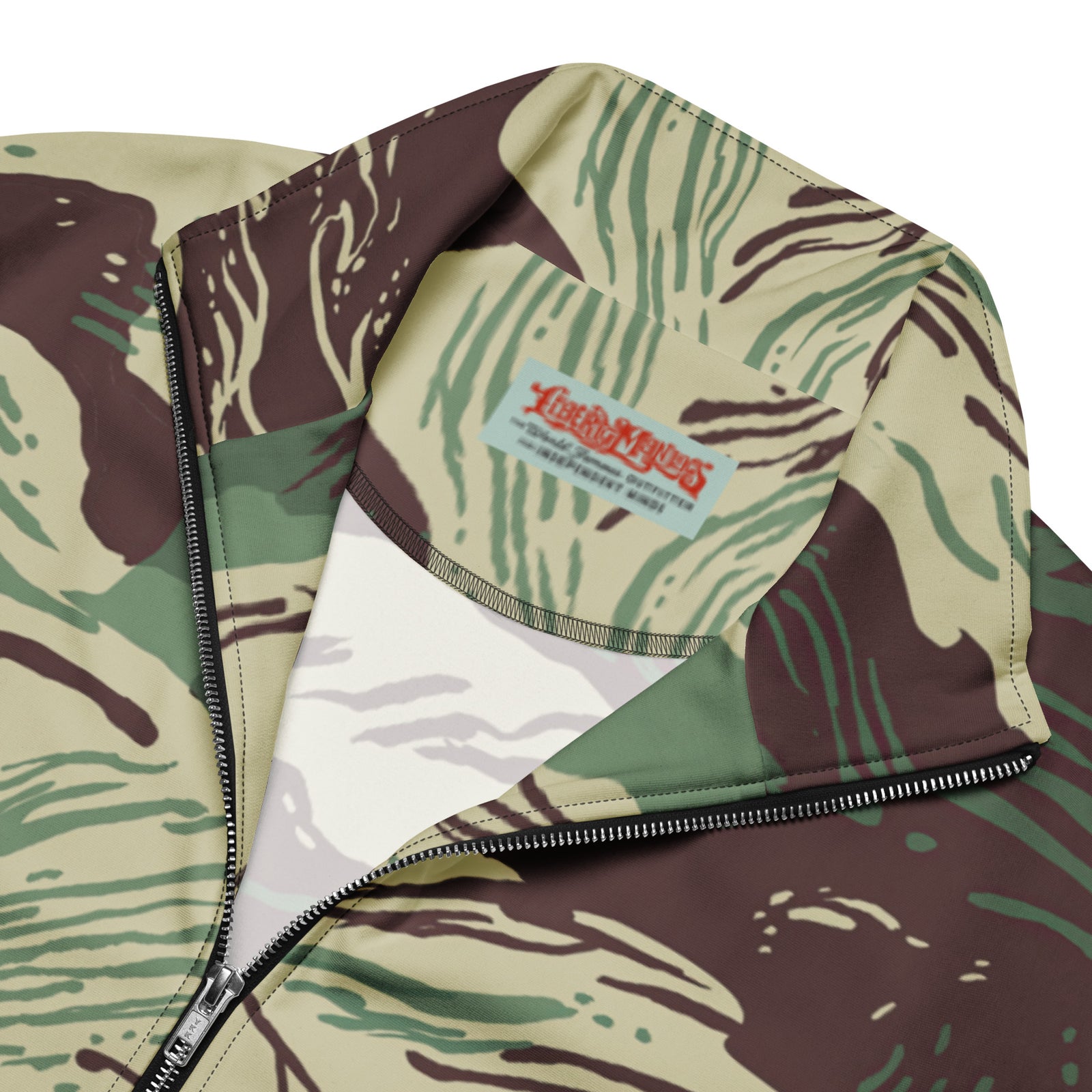 Close-up of Rhodesian Brushstroke Camo Track Jacket zipper and pattern by Liberty Maniacs